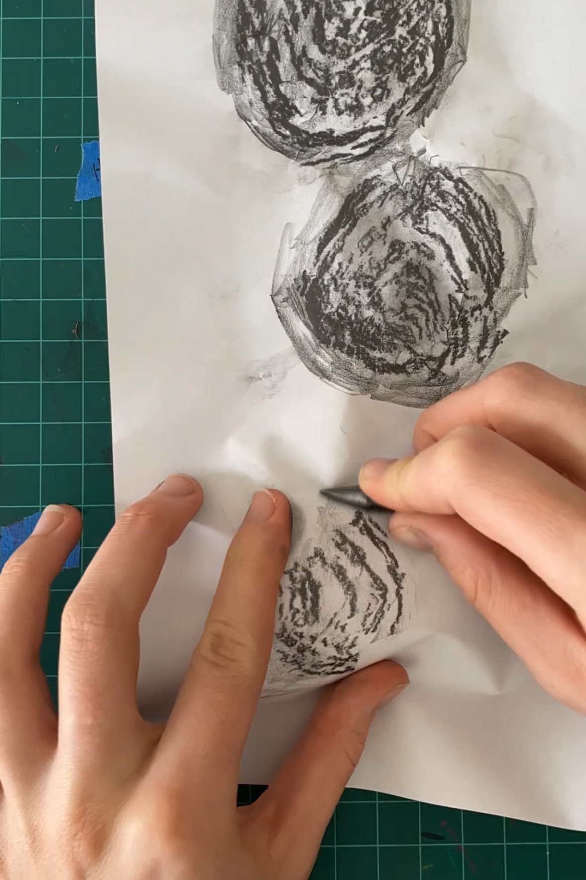 I wanted to create a piece based in repetitive action... because so much of nature is repetitive action like the changing of the seasons and the blooming of spring. I began by doing pages full of graphite rubbings of this stone.