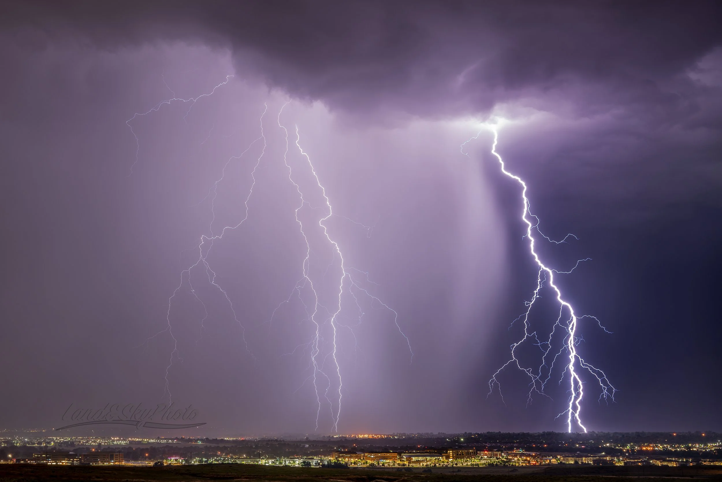 A series of tall lightning bolts strike Broomfield and Boulder Colorado at 2am 
