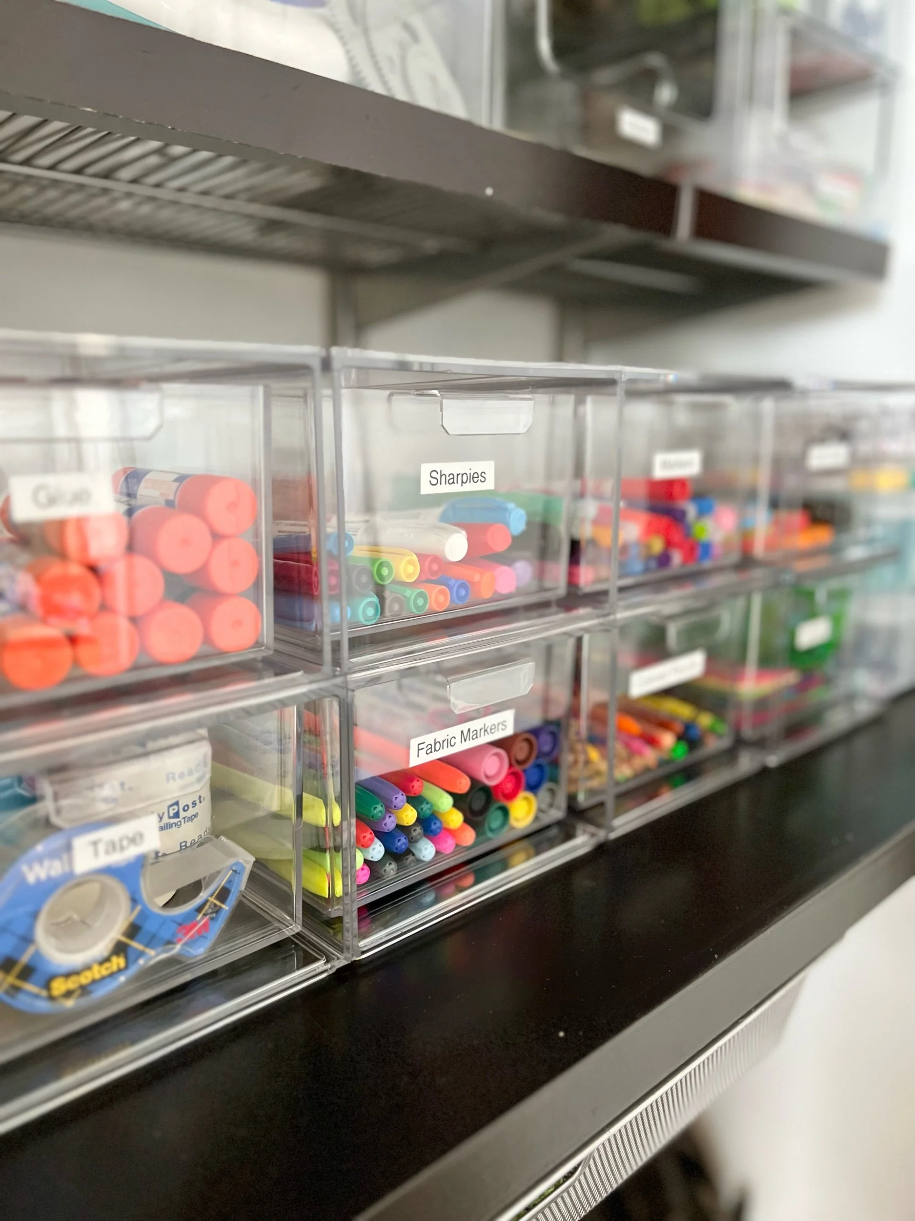 Clear bins for closet storage for arts and crafts
