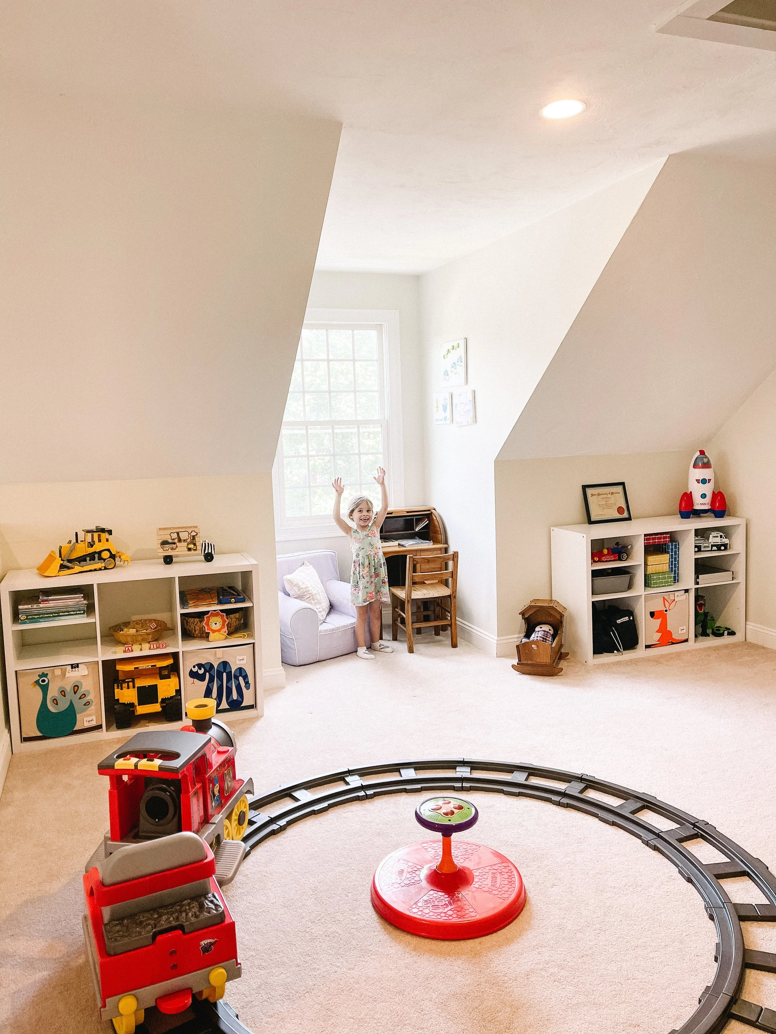 Attic playroom with cubbies for toy storage