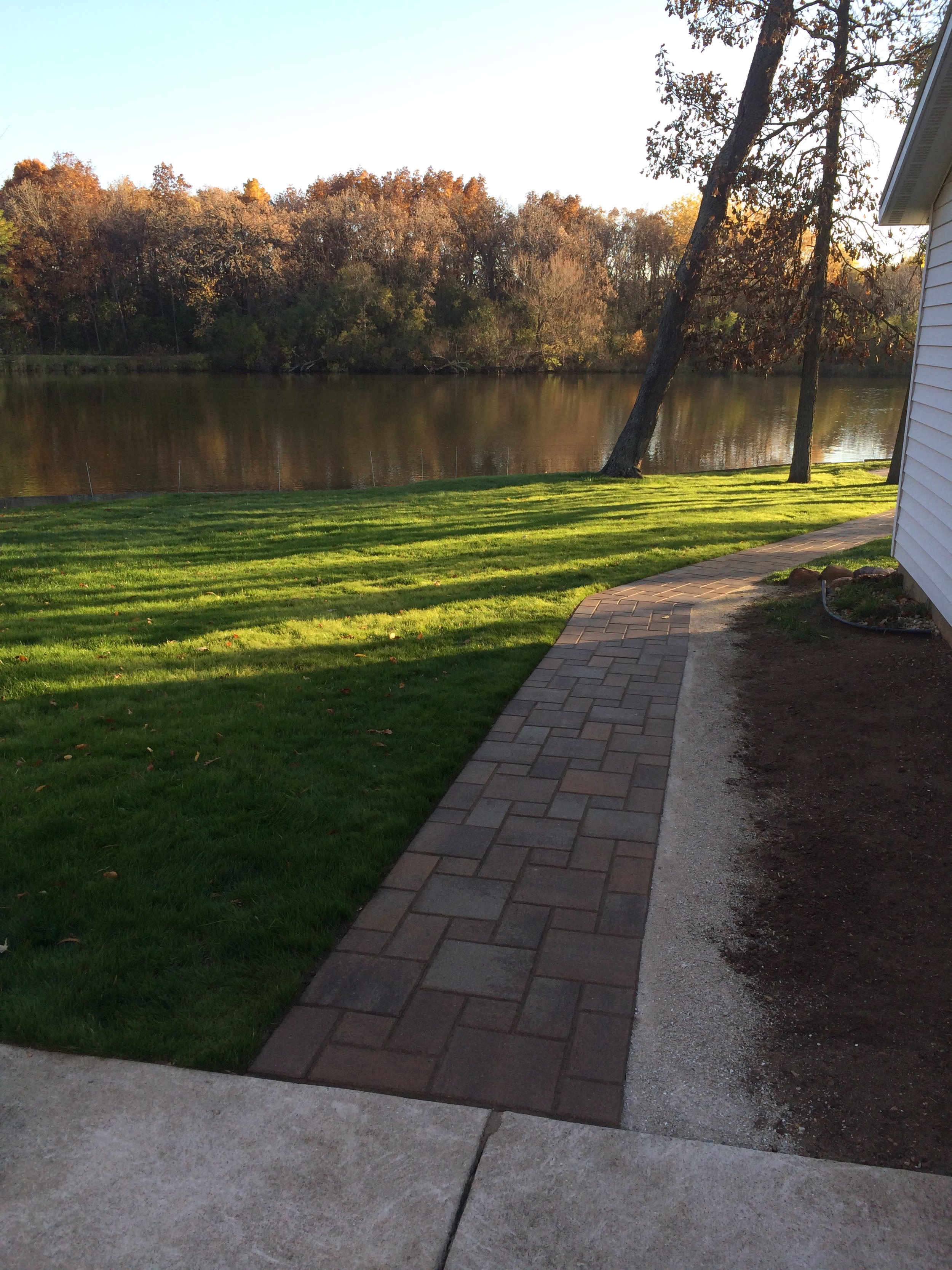Start a new brick paver path to the lake