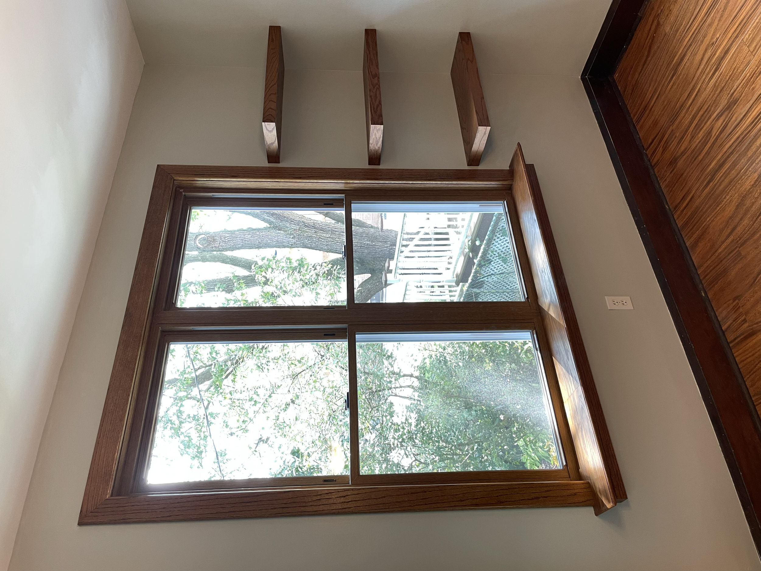AFTER: INSTALLATION OF LARGER WINDOW & FLOATING SHELVES