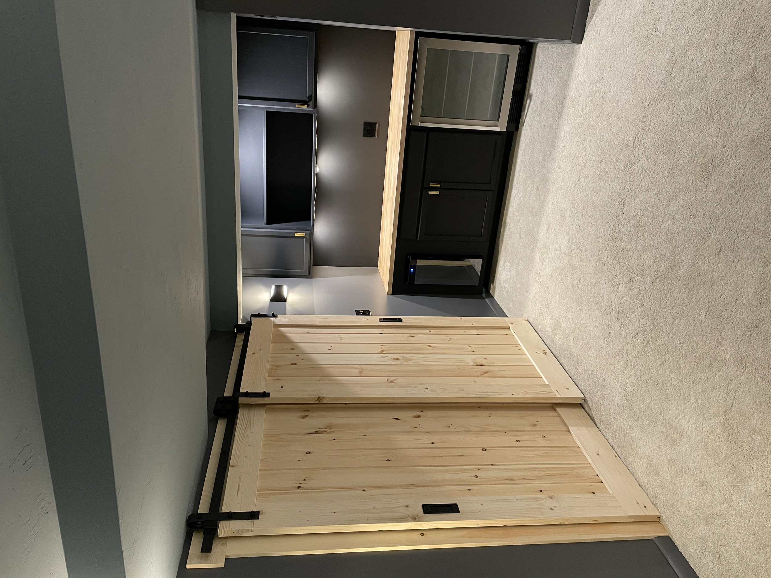 AFTER: CUSTOM BARN DOORS & KITCHENETTE WITH LIGHTING