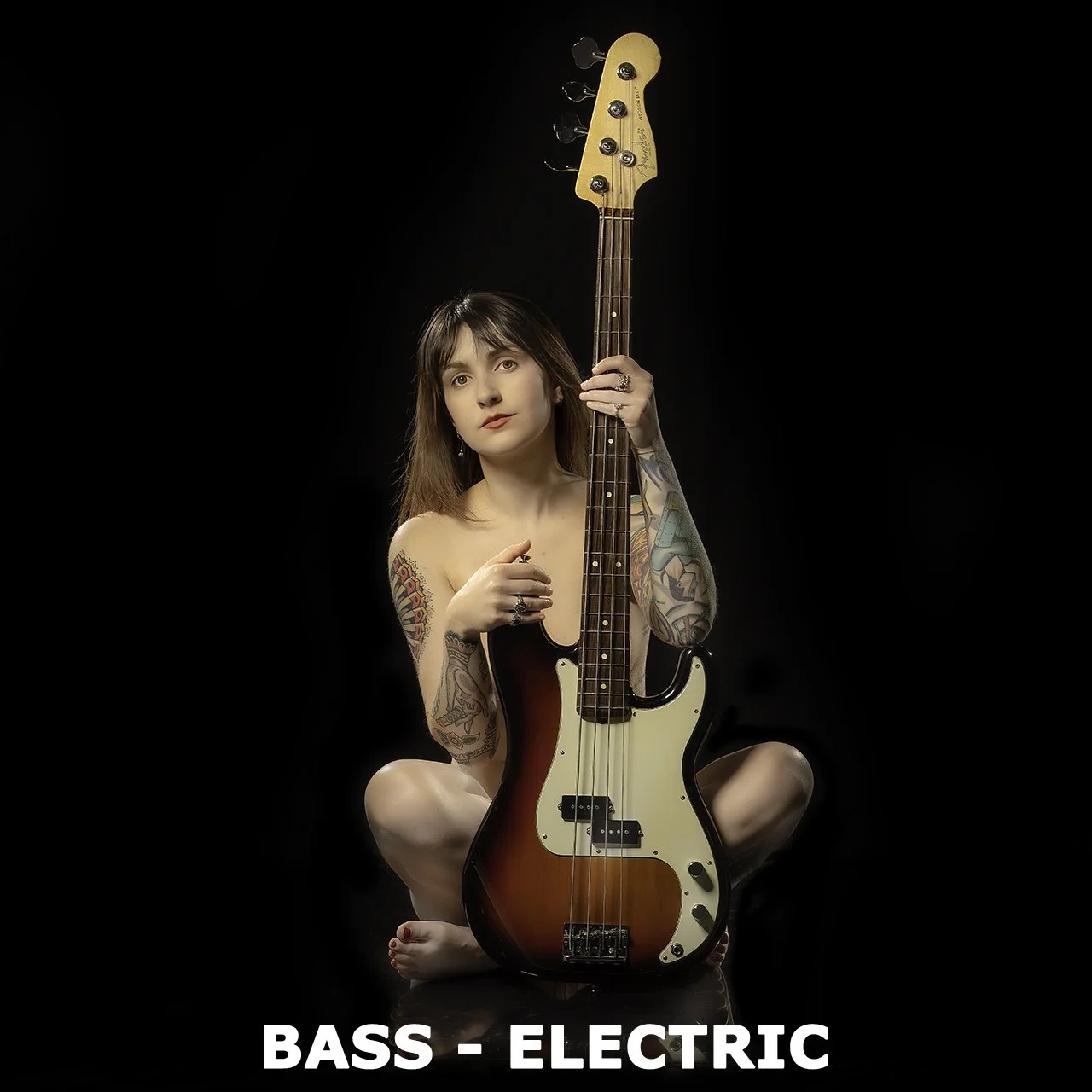 Jessica (26) All girl band bass player. Shot in studio, Barrie, April 2024.
