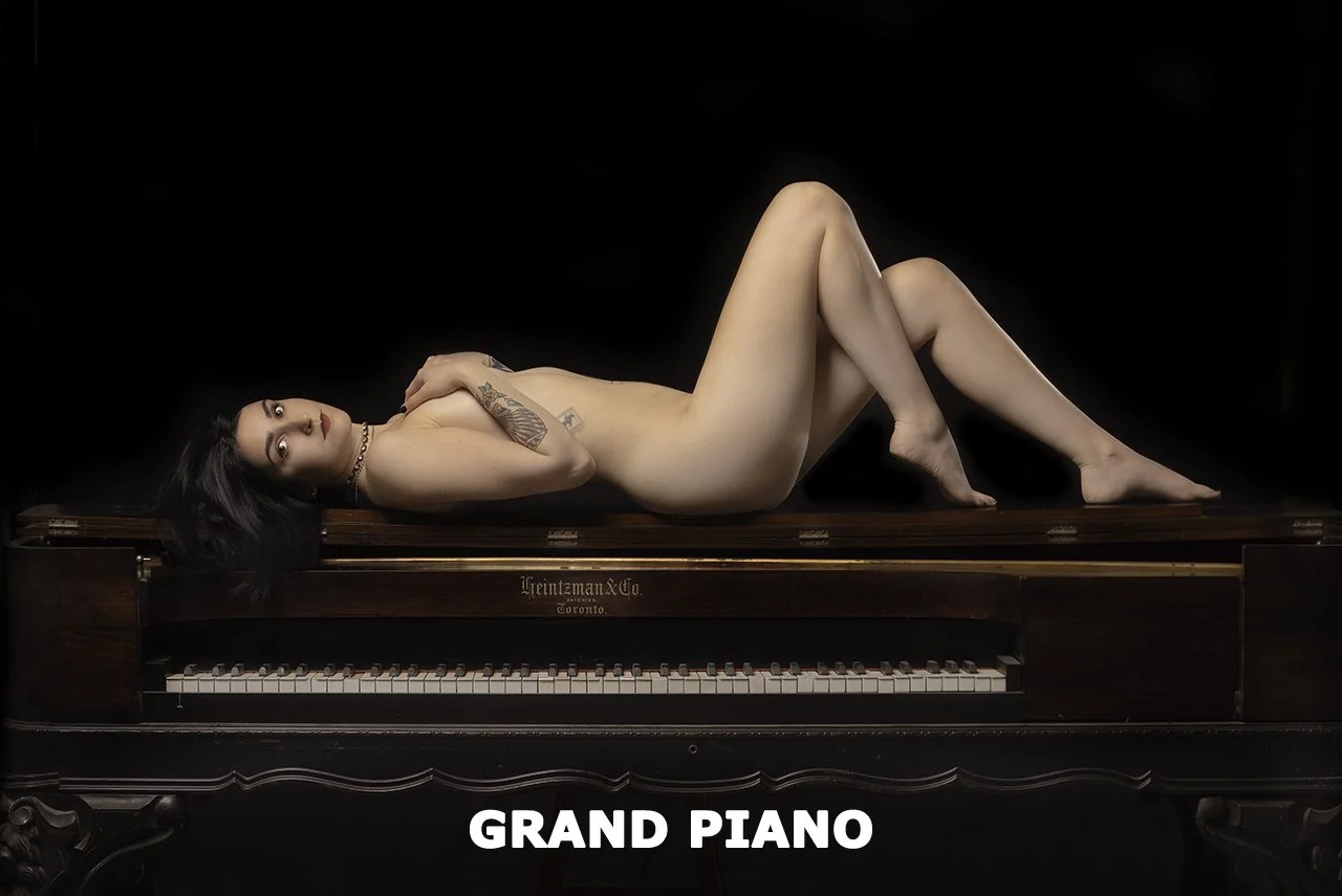 Jessica (24) All girl band keyboard player and daugther of the Classic Guitar model. Shot in studio, Barrie, October 2021