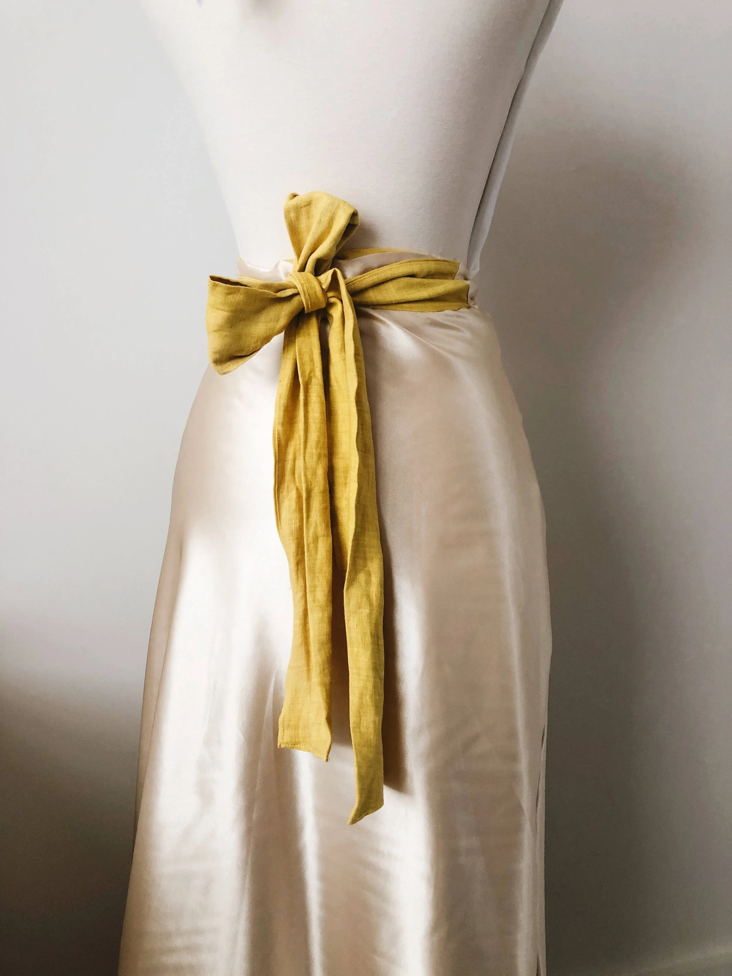 A reversible linen and silk wrap skirt, natural dyed with Turmeric.