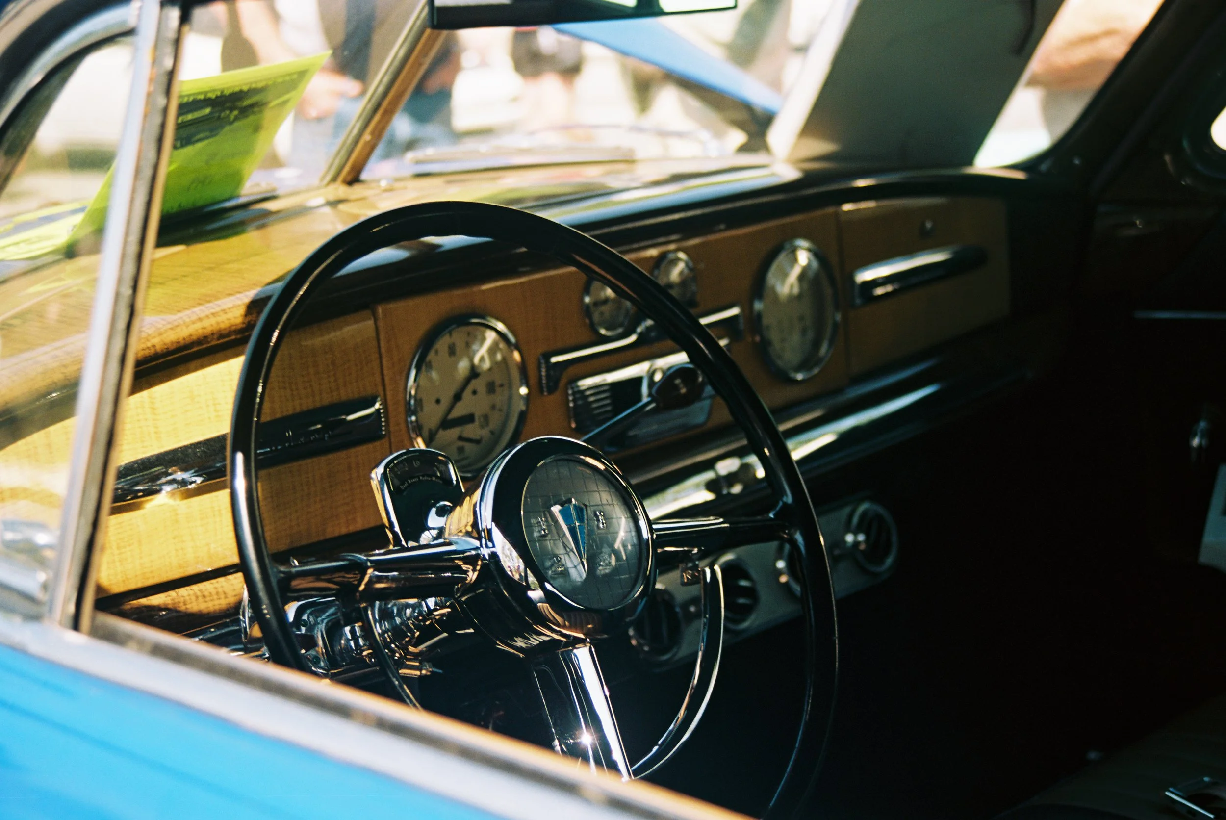 up close interior film photo of a classic car