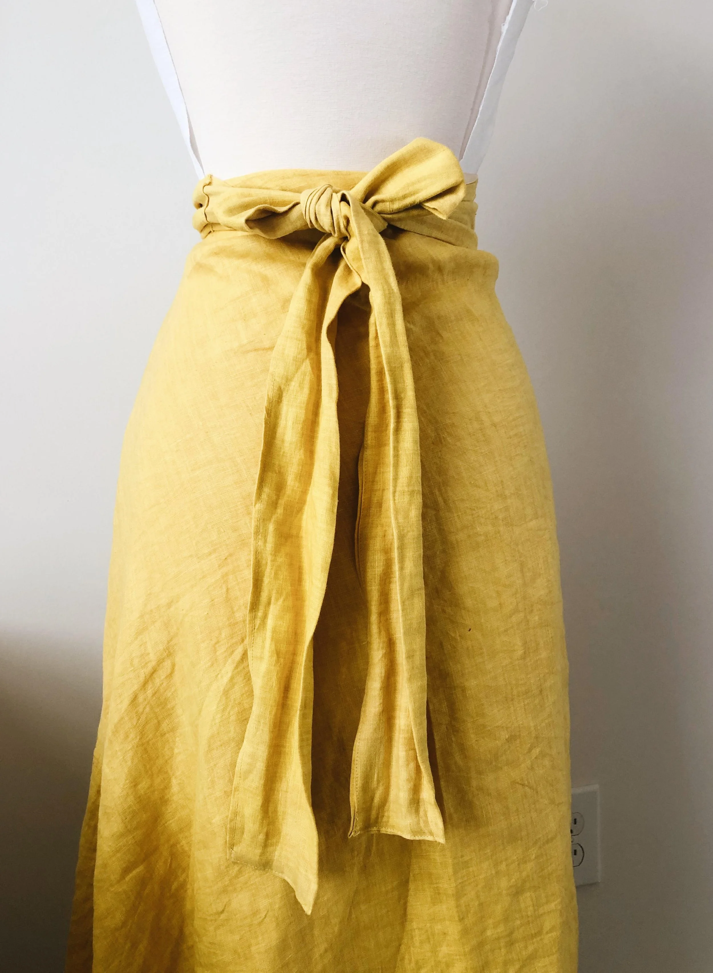 A reversible linen and silk wrap skirt, natural dyed with Turmeric.