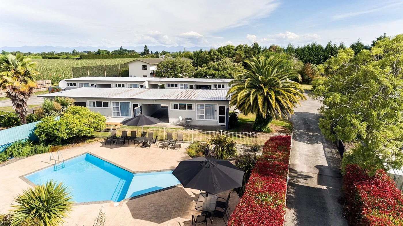 View of pool, gardens and surrounds