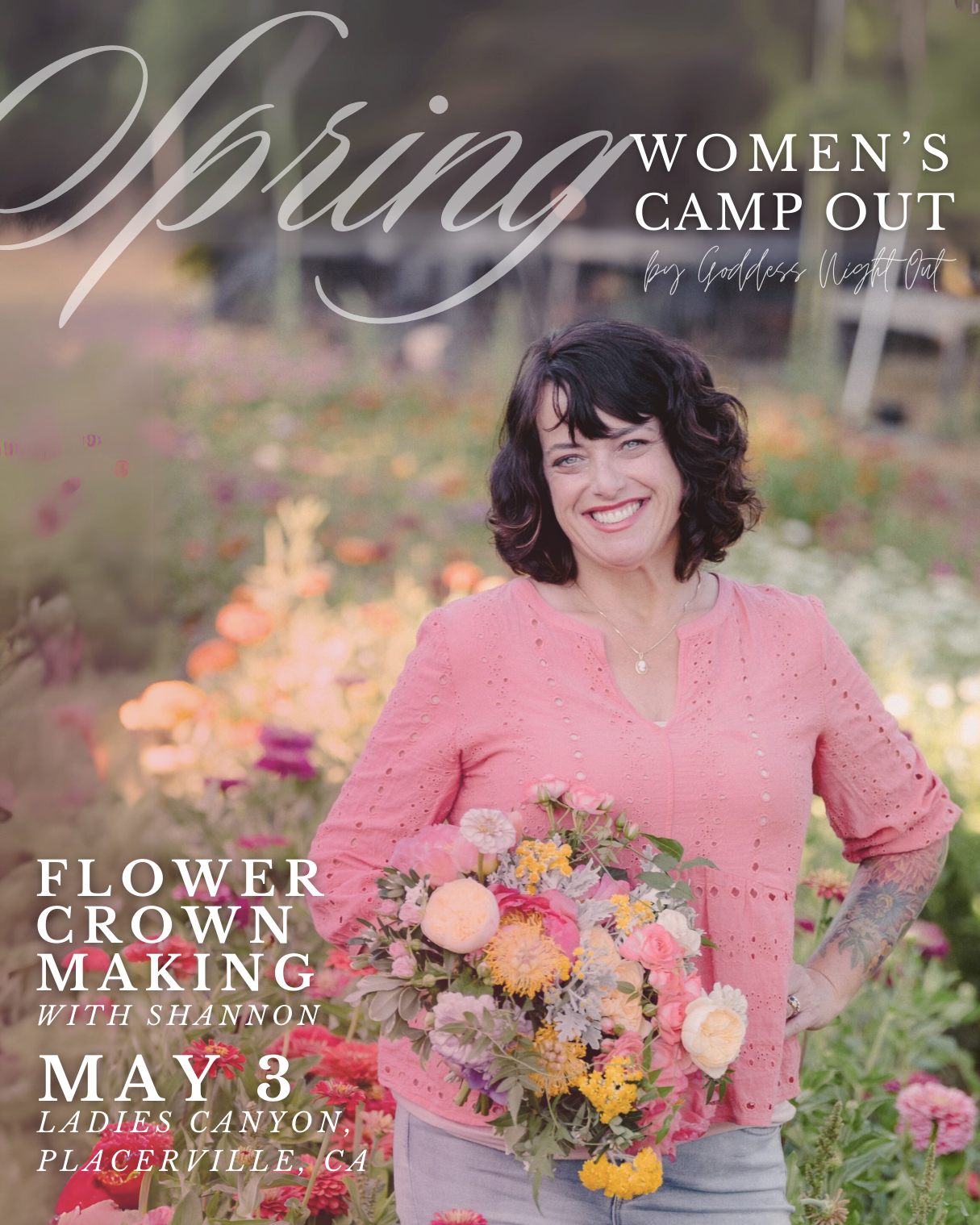 Woman in a pink blouse holding a colorful bouquet in a flower garden, advertising a Spring Women’s Camp Out event featuring flower crown making on May 3 in Ladies Canyon, Placerville, CA.