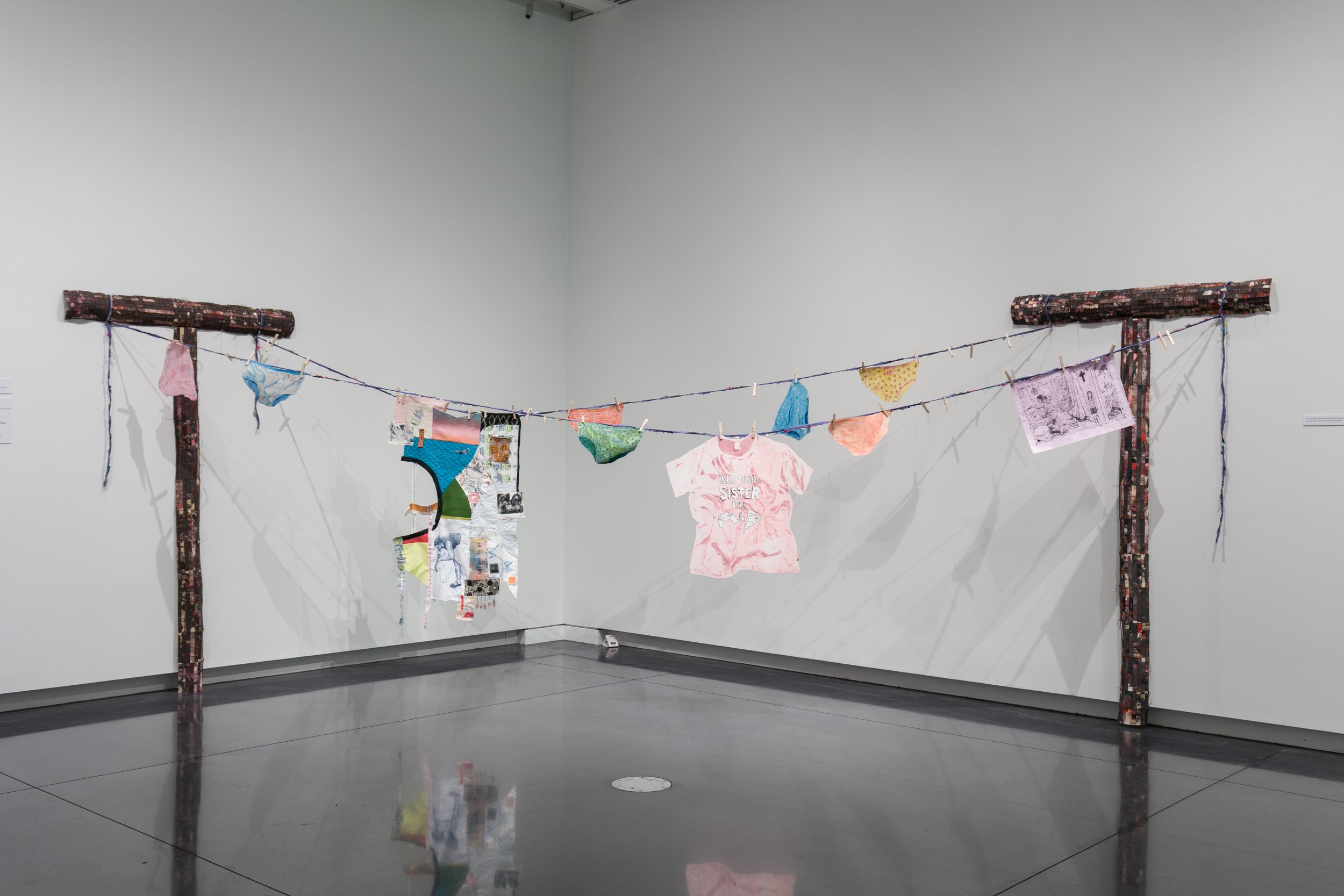 Laundry Lines (installation); screenprint monotype on various printmaking papers, thread, chicken wire; 2024