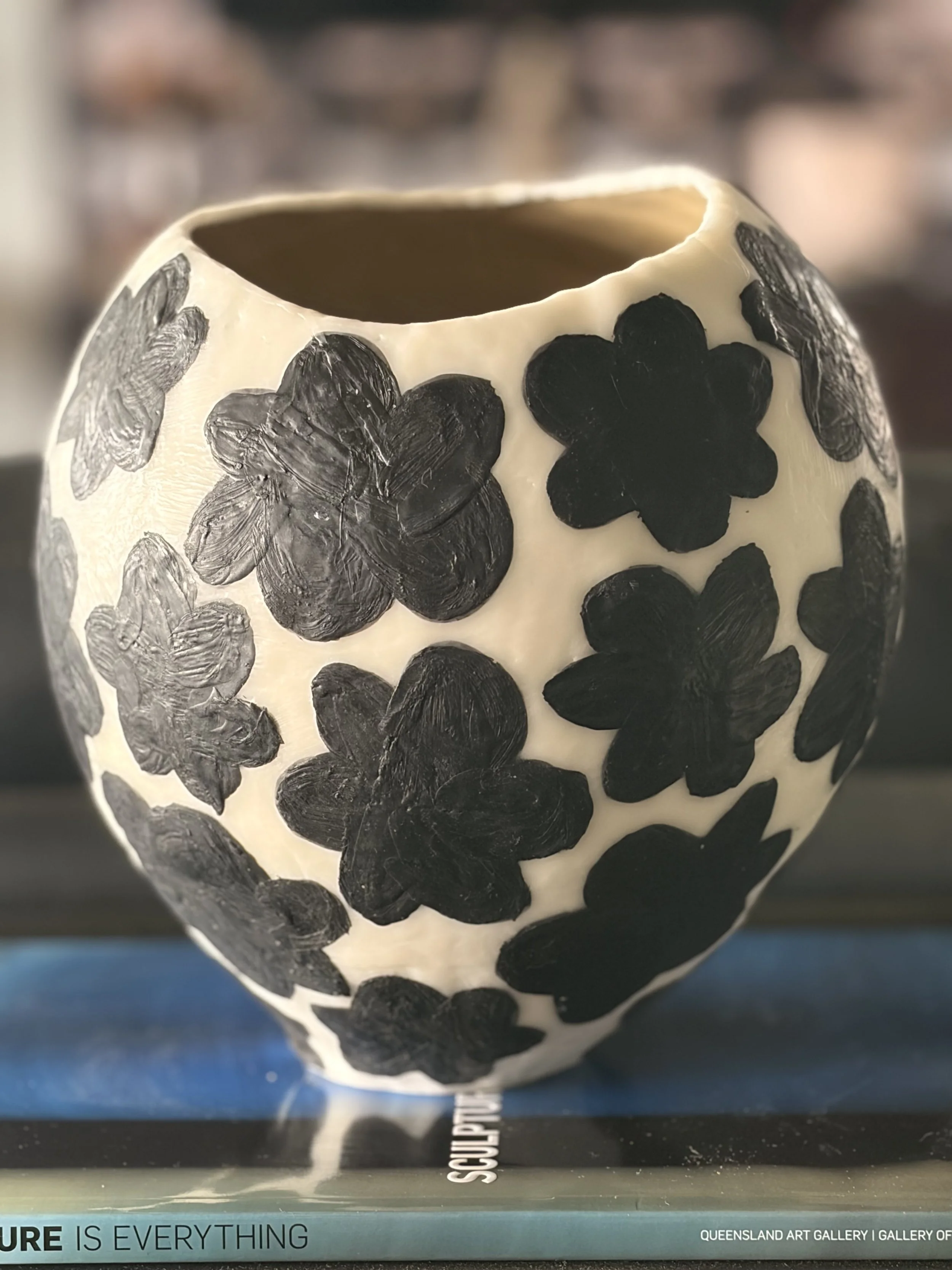 Handmade encaustic wax vessel with black floral patterns on ivory background, textured surface, resin-lined interior, contemporary sculptural bowl by Australian artist Karen Canning Studio Fifty Three