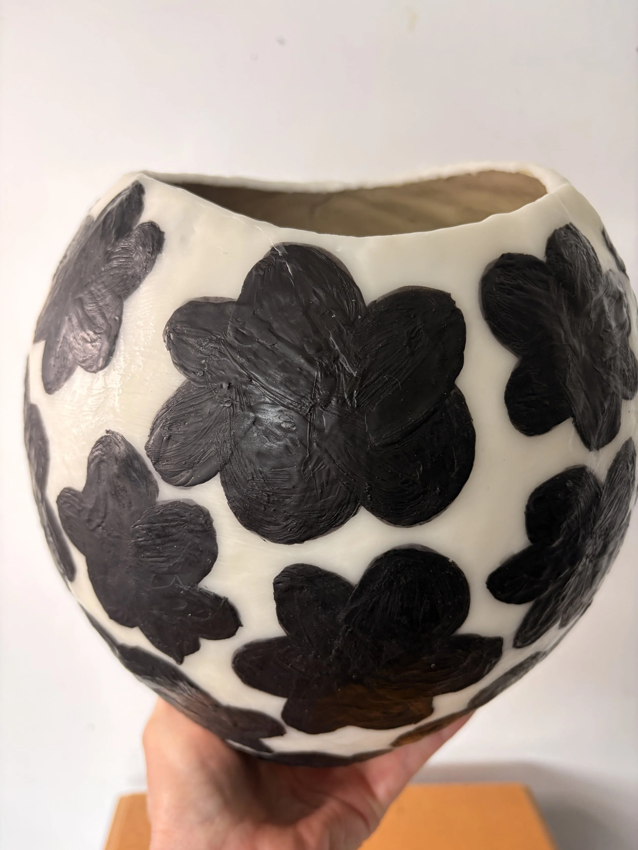 Handmade encaustic wax vessel with black floral patterns on ivory background, textured surface, resin-lined interior, contemporary sculptural bowl by Australian artist Karen Canning Studio Fifty Three