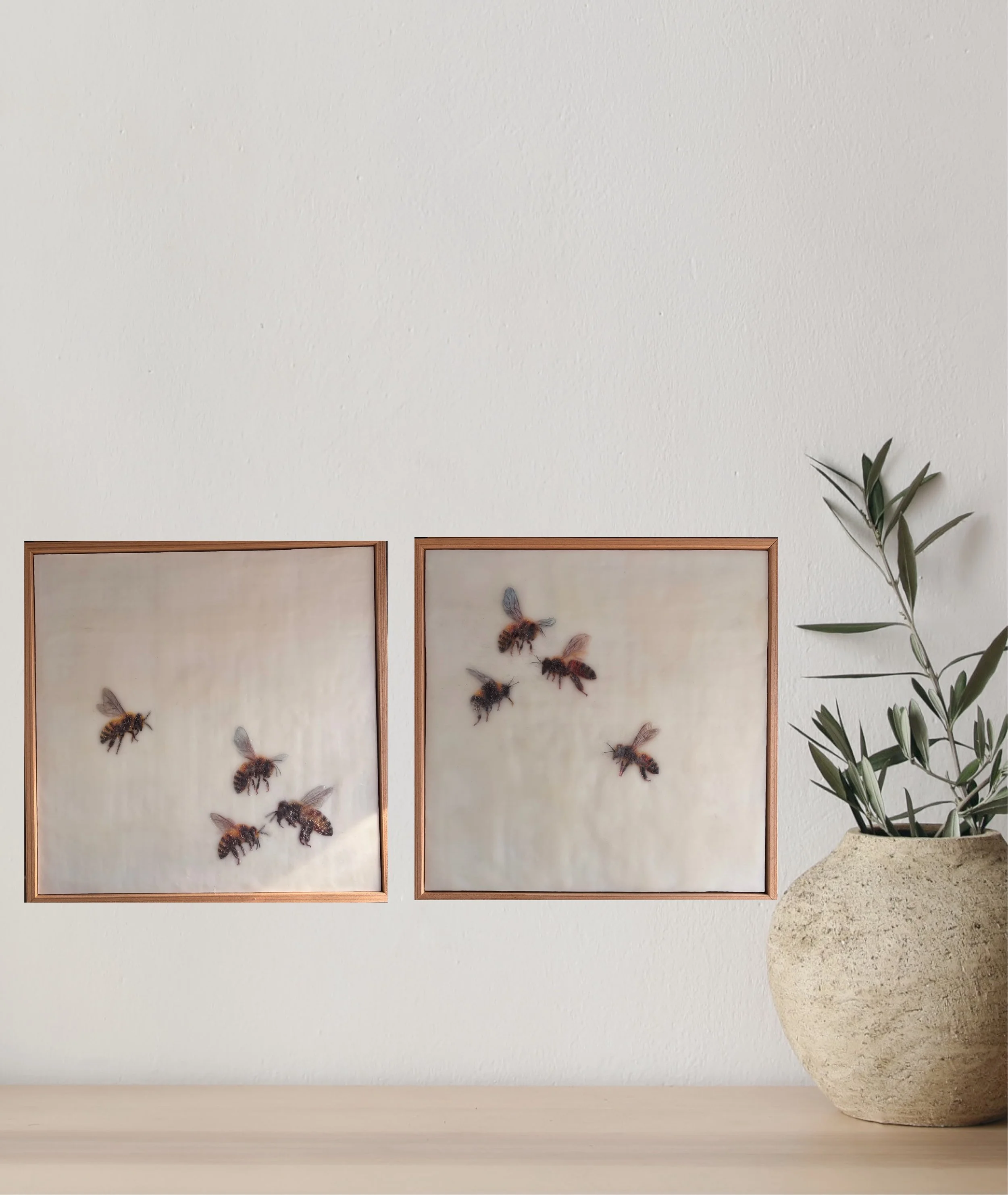 “Come Join Us #1 by Karen Canning. Contemporary encaustic wax and mixed media artwork featuring four realistic bees floating across a luminous cream background. Framed . 33 x 33 cm.”