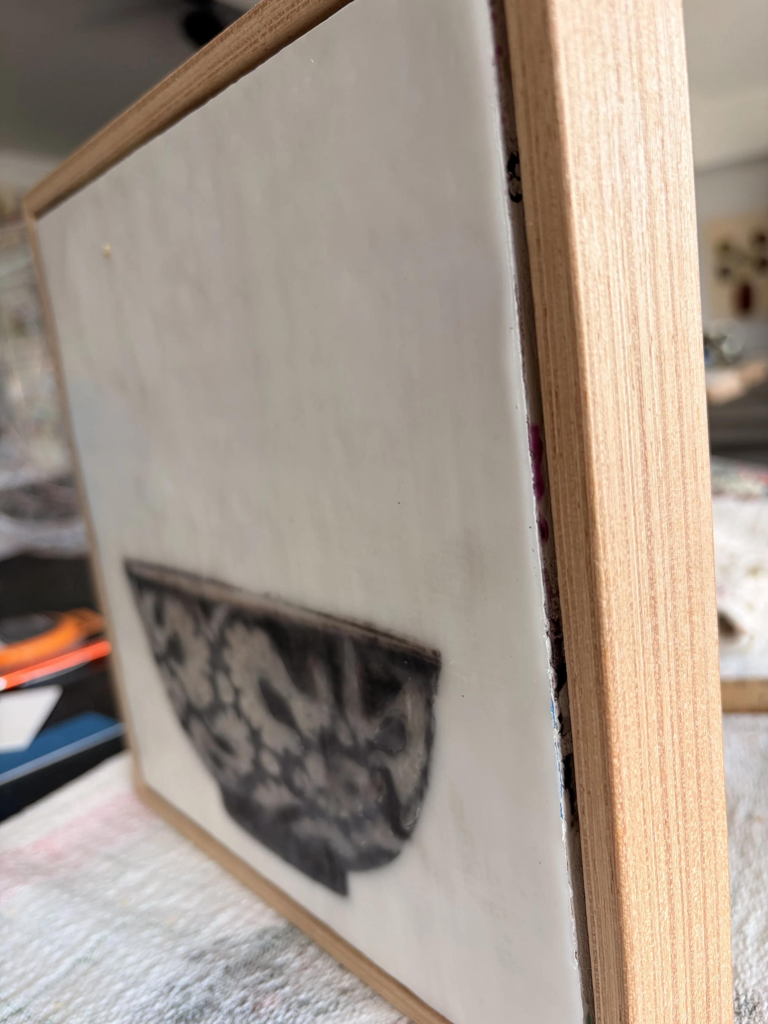 Encaustic wax and mixed media artwork titled “Holiday Treasure” by Karen Canning, featuring layered textures, warm tones and luminous depth in a 22 x 22cm square format.