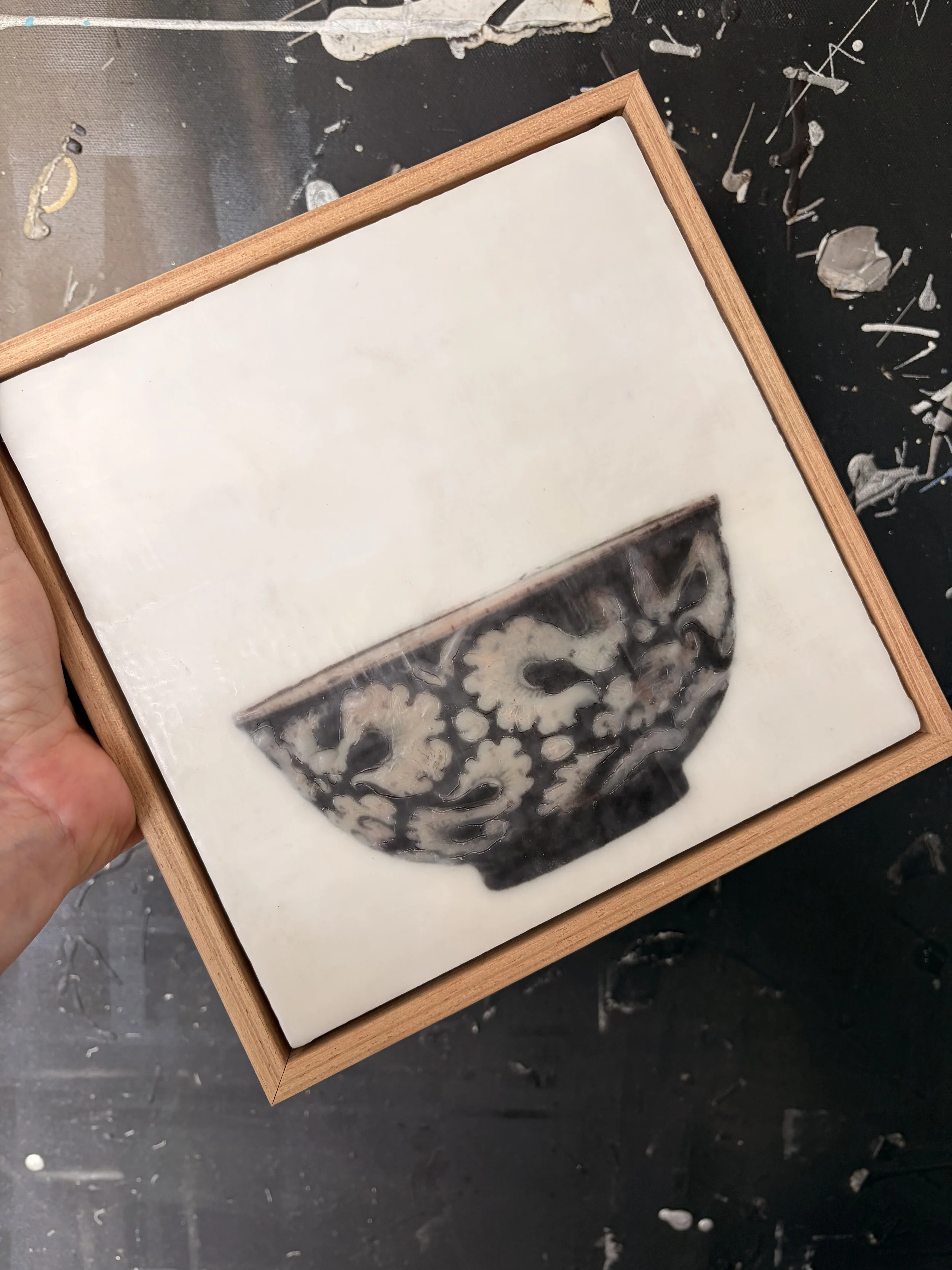 Encaustic wax and mixed media artwork titled “Holiday Treasure” by Karen Canning, featuring layered textures, warm tones and luminous depth in a 22 x 22cm square format.