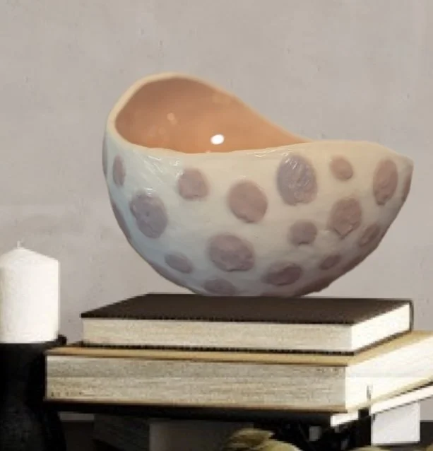 Original encaustic wax and resin vessel titled Musk Stick by Australian artist Karen Canning featuring soft blush pink raised dots on an ivory beeswax surface with a glossy pale pink resin interior.