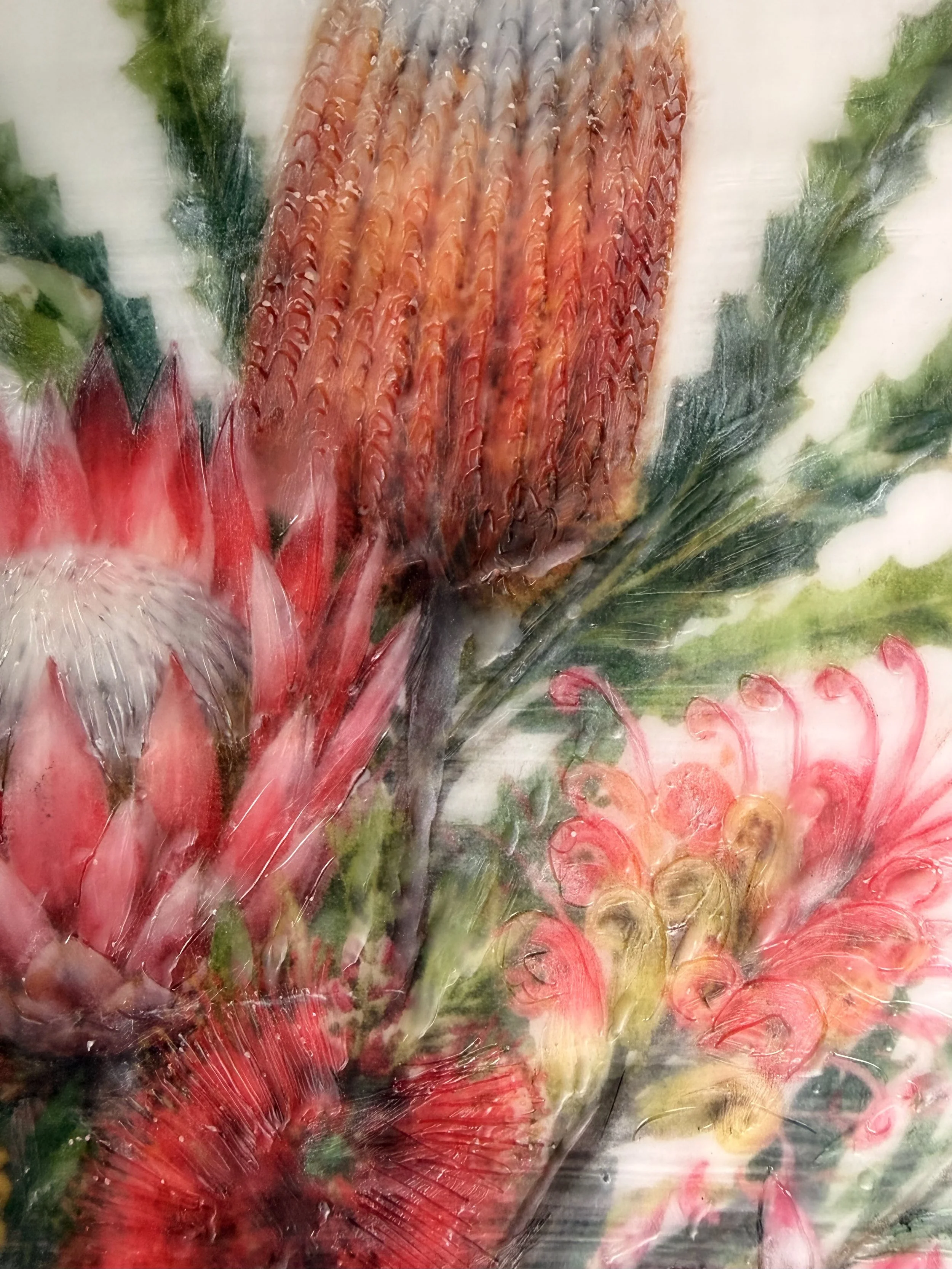 Encaustic wax and mixed media artwork featuring Australian native flowers including banksia, protea, bottlebrush and wattle on a soft ivory background, framed in natural timber.