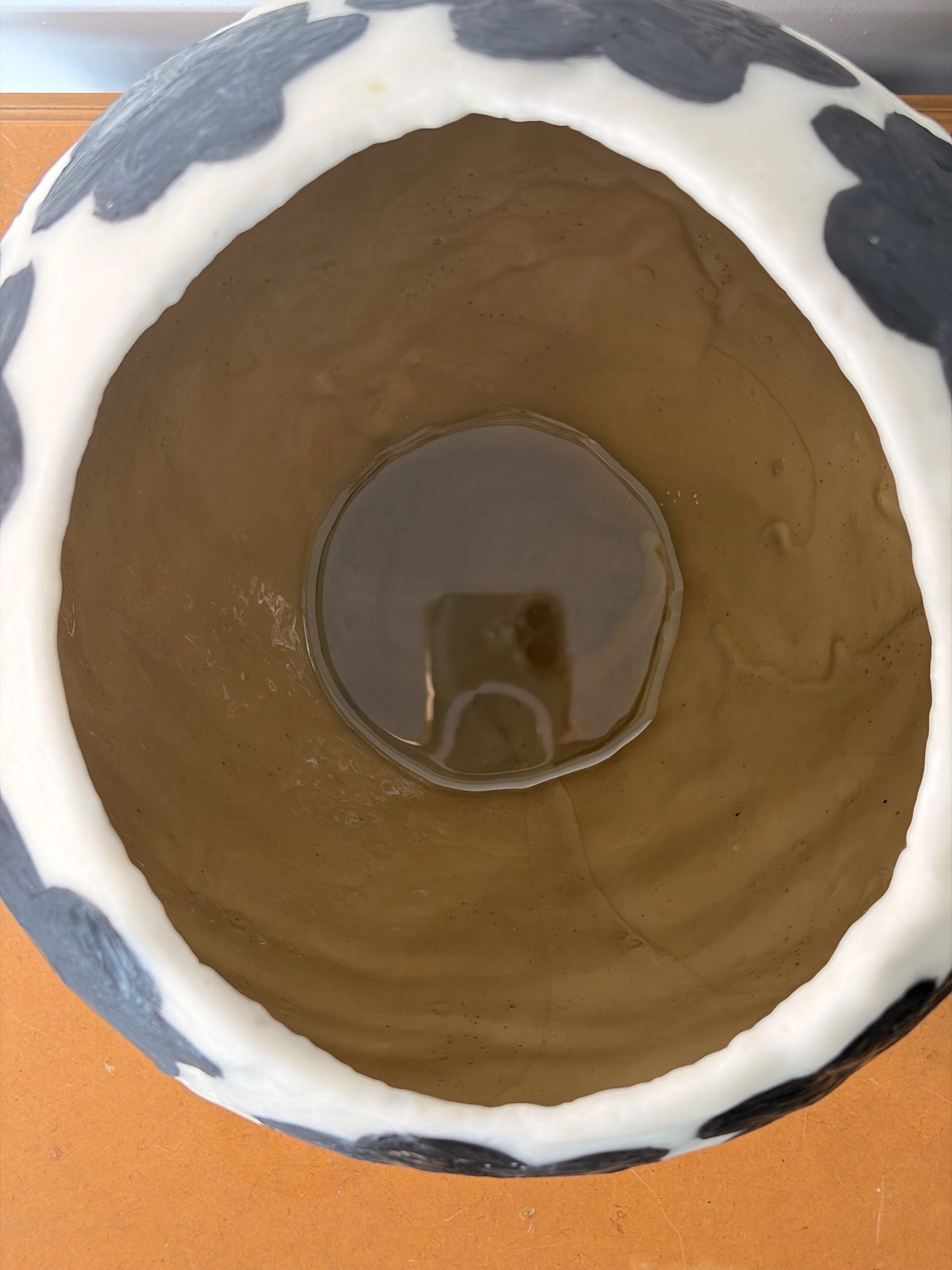 Handmade encaustic wax vessel with black floral patterns on ivory background, textured surface, resin-lined interior, contemporary sculptural bowl by Australian artist Karen Canning Studio Fifty Three