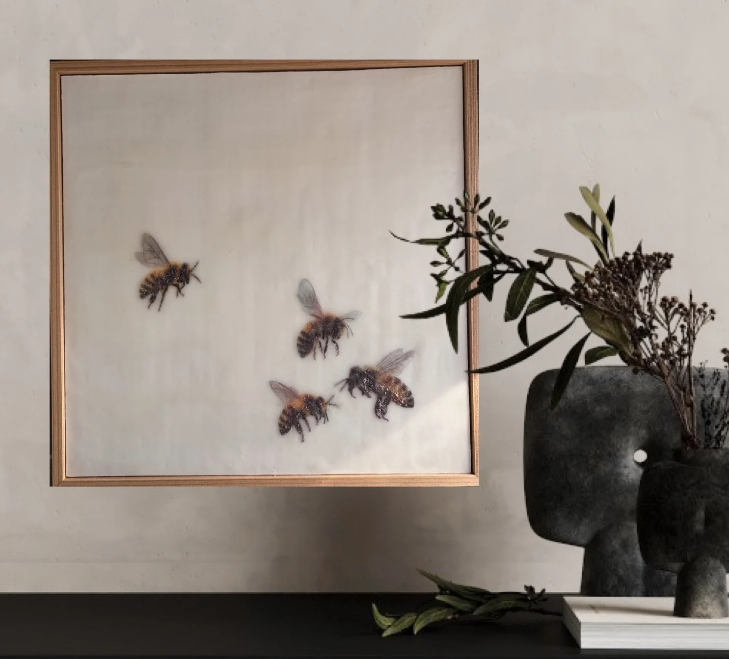“Come Join Us #1 by Karen Canning. Contemporary encaustic wax and mixed media artwork featuring four realistic bees floating across a luminous cream background. Framed . 33 x 33 cm.”