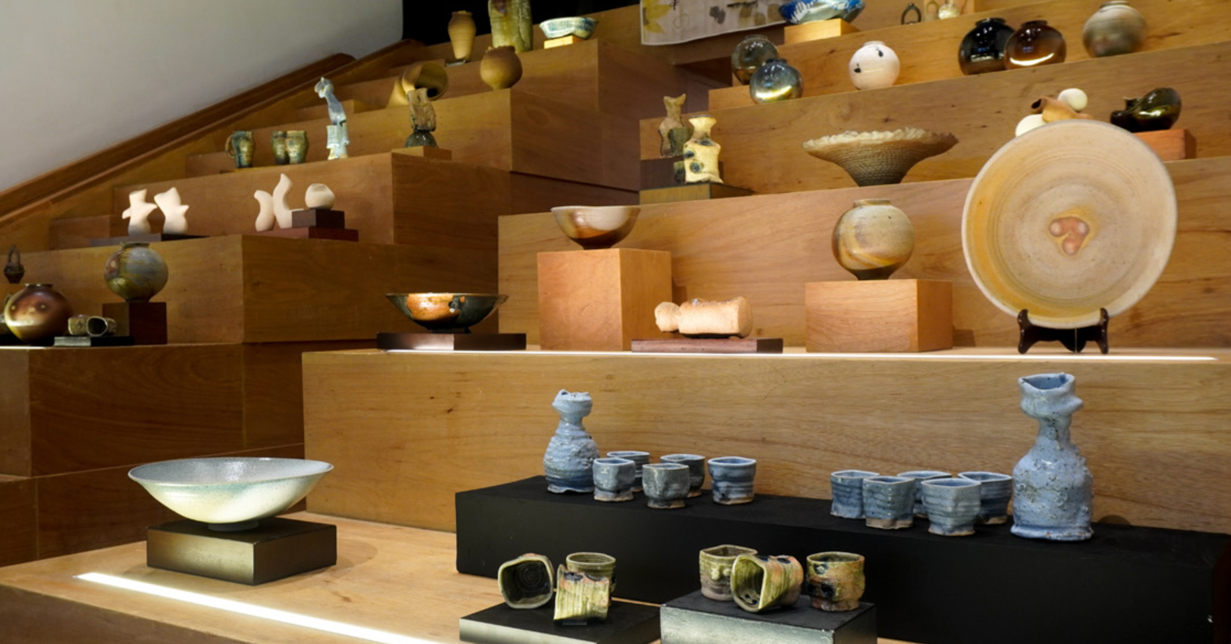 Jose Solon Perfecto's studio pottery on the steps of Aphro Makati