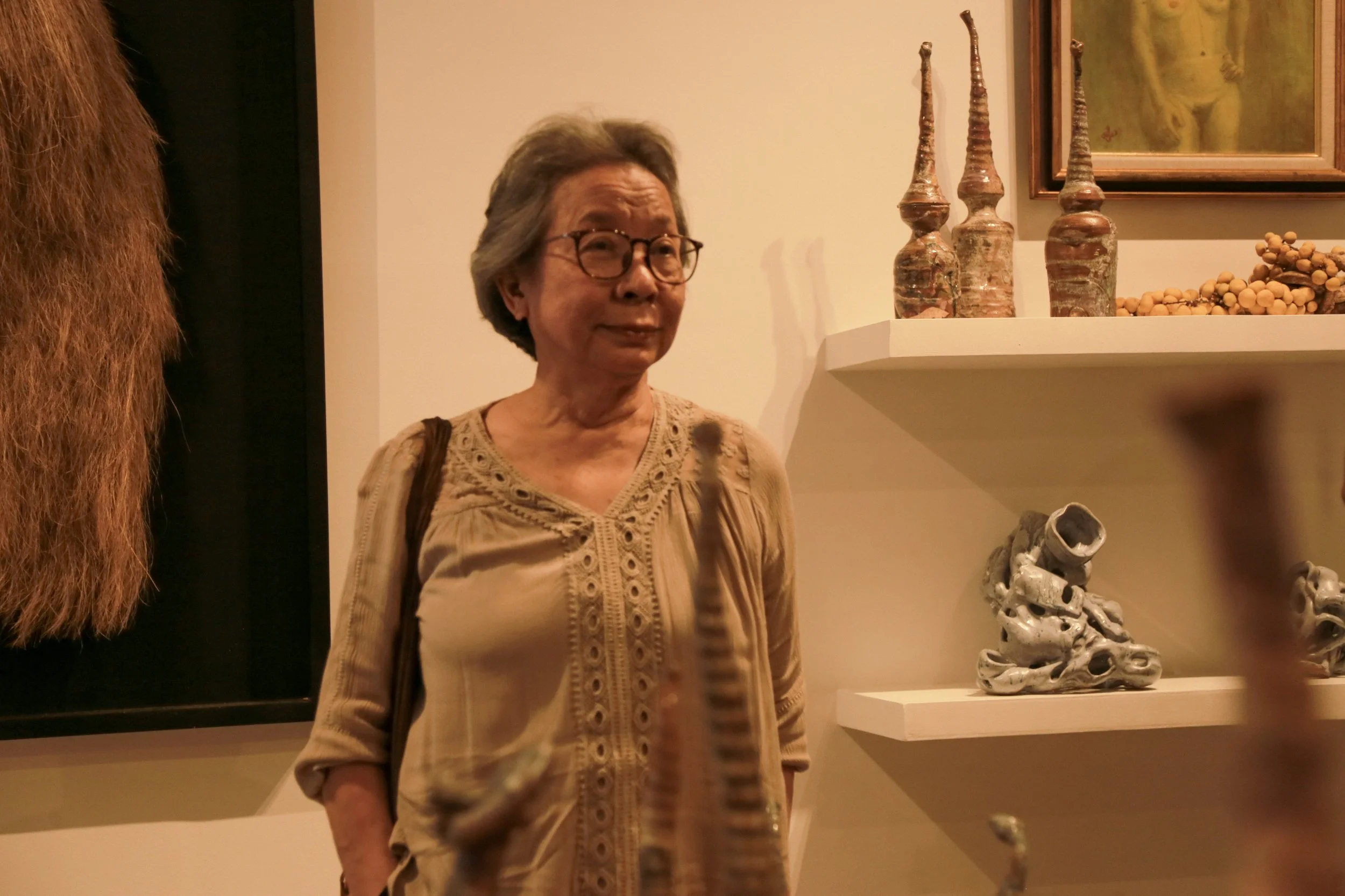 Filipino ceramic artist Tessy Pettyjohn at Perfecto Deli, solo exhibit of her former student Jose Solon Perfecto
