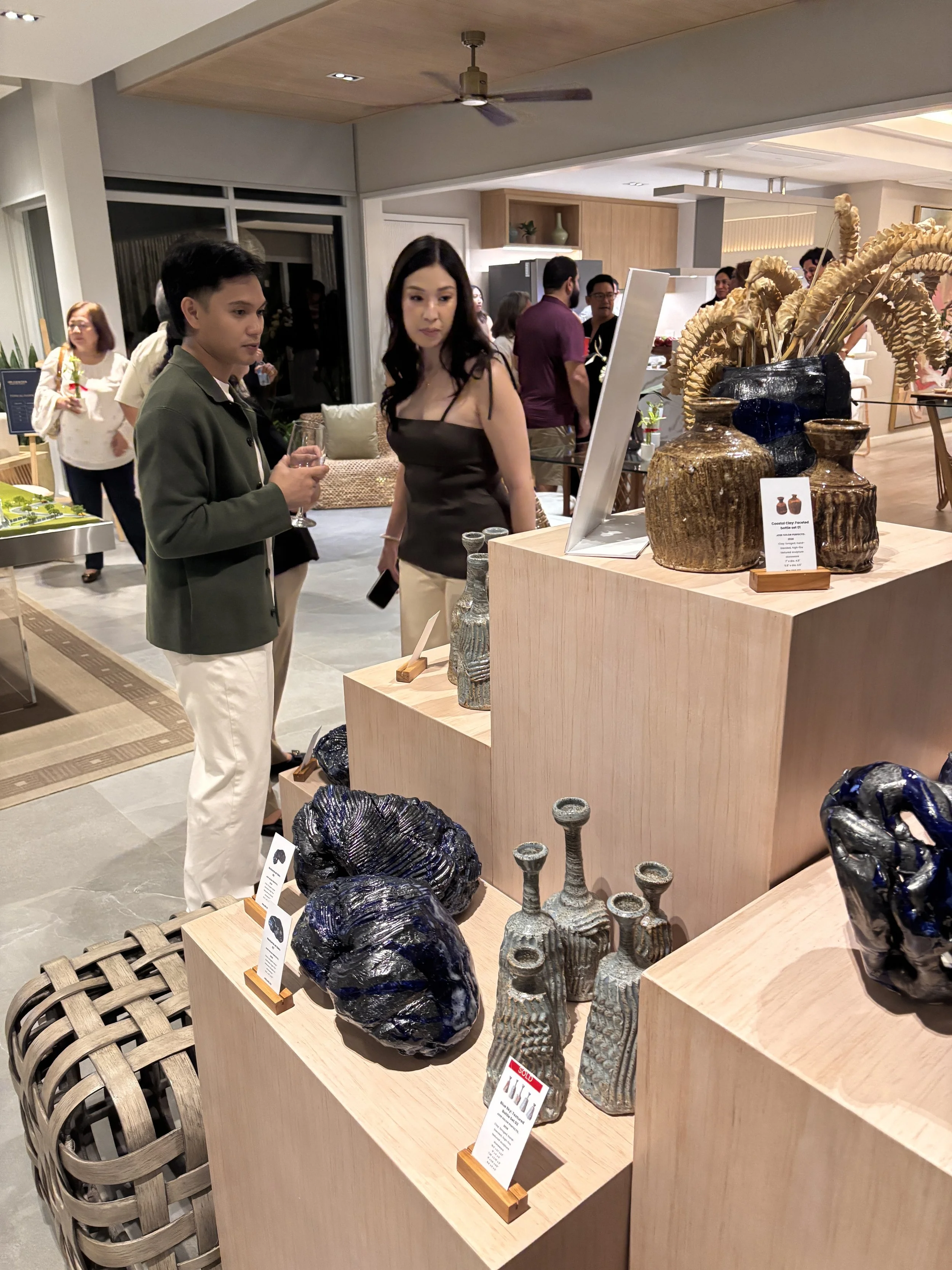 Metallic ceramics and rustic pottery by Jose Solon Perfecto in Cebu for a pop-up event at Rockwell