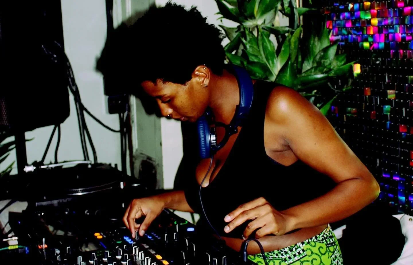 DJ mixing behind the decks at Oculist Brighton.