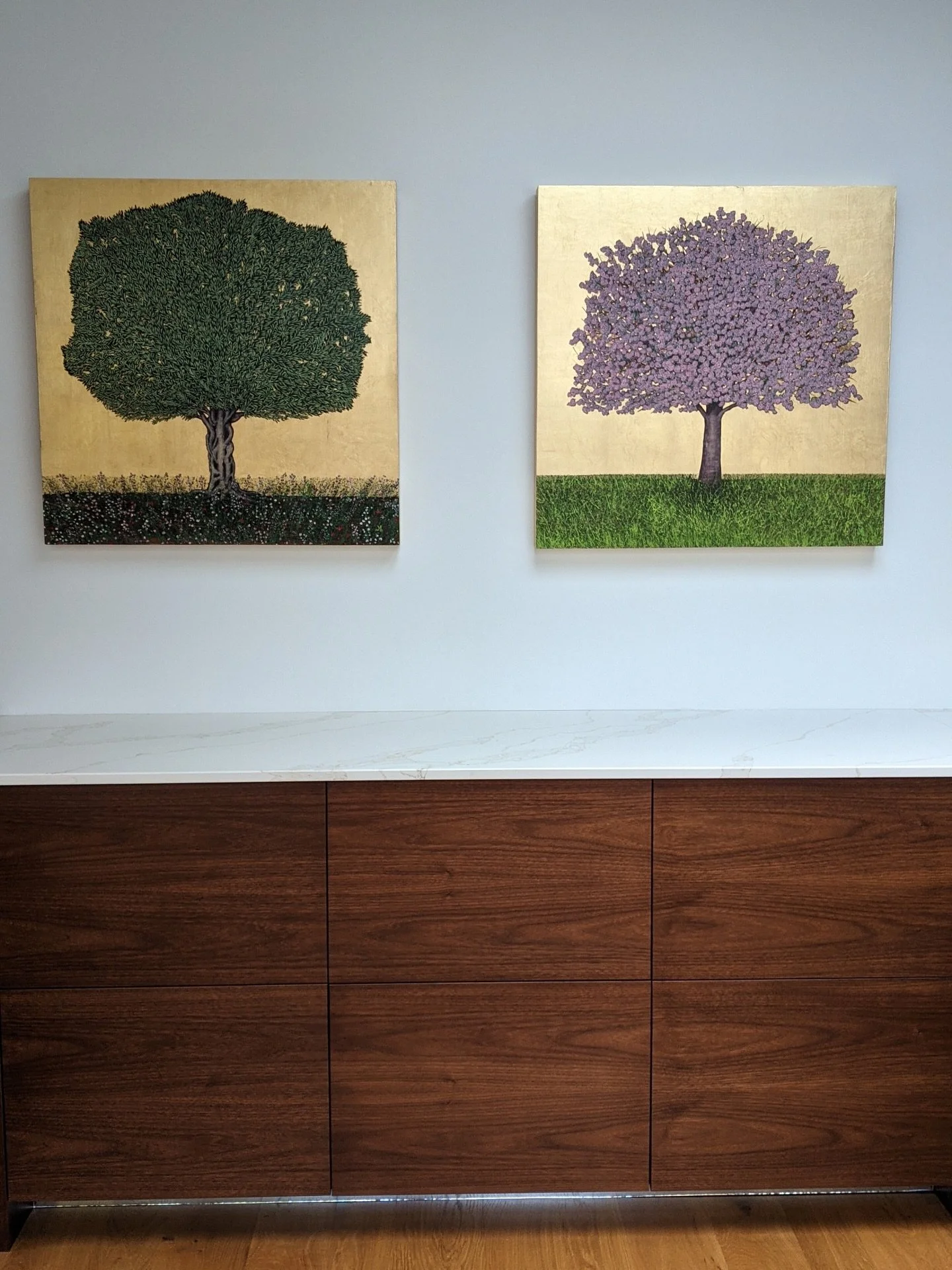 I love when collectors send me photos of my paintings on their walls. These two large paintings are in Angela&rsquo;s kitchen diner and give a lovely golden glow to the area.😍. #sold #soldasapair #artforlivingspaces #olivetreepainting #cherryblossom