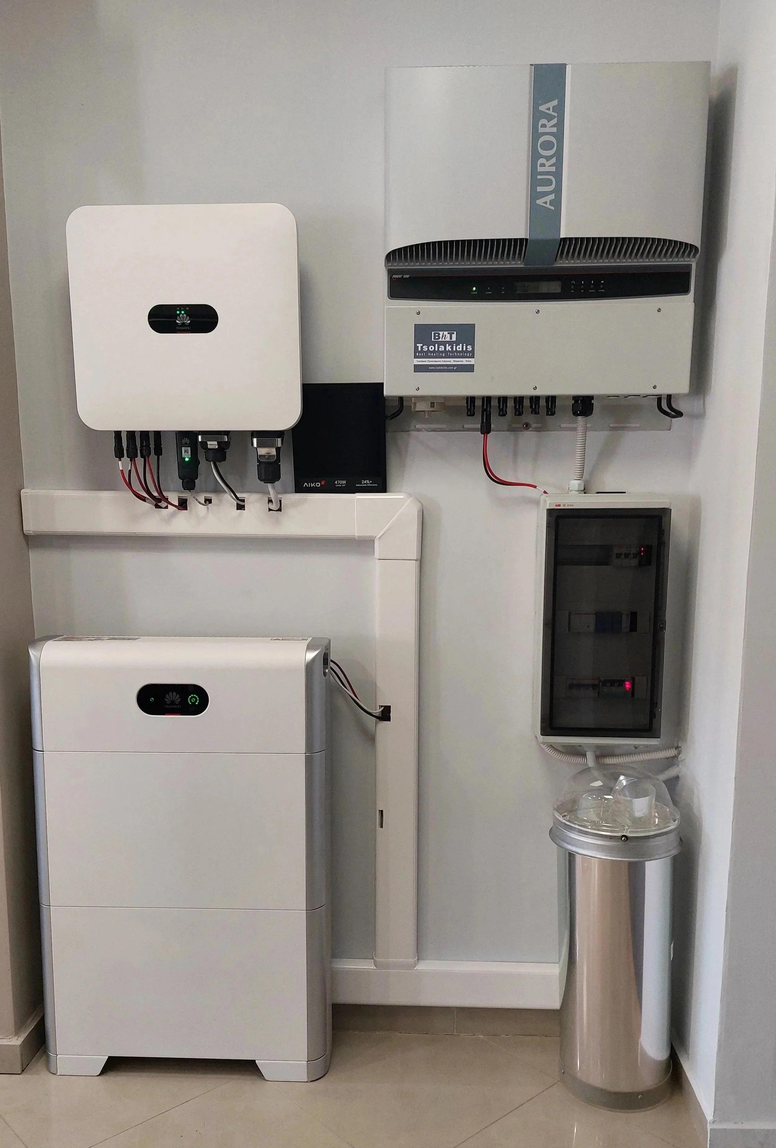 Functional solar PV system display with inverter and batteries at Tsolakidis store