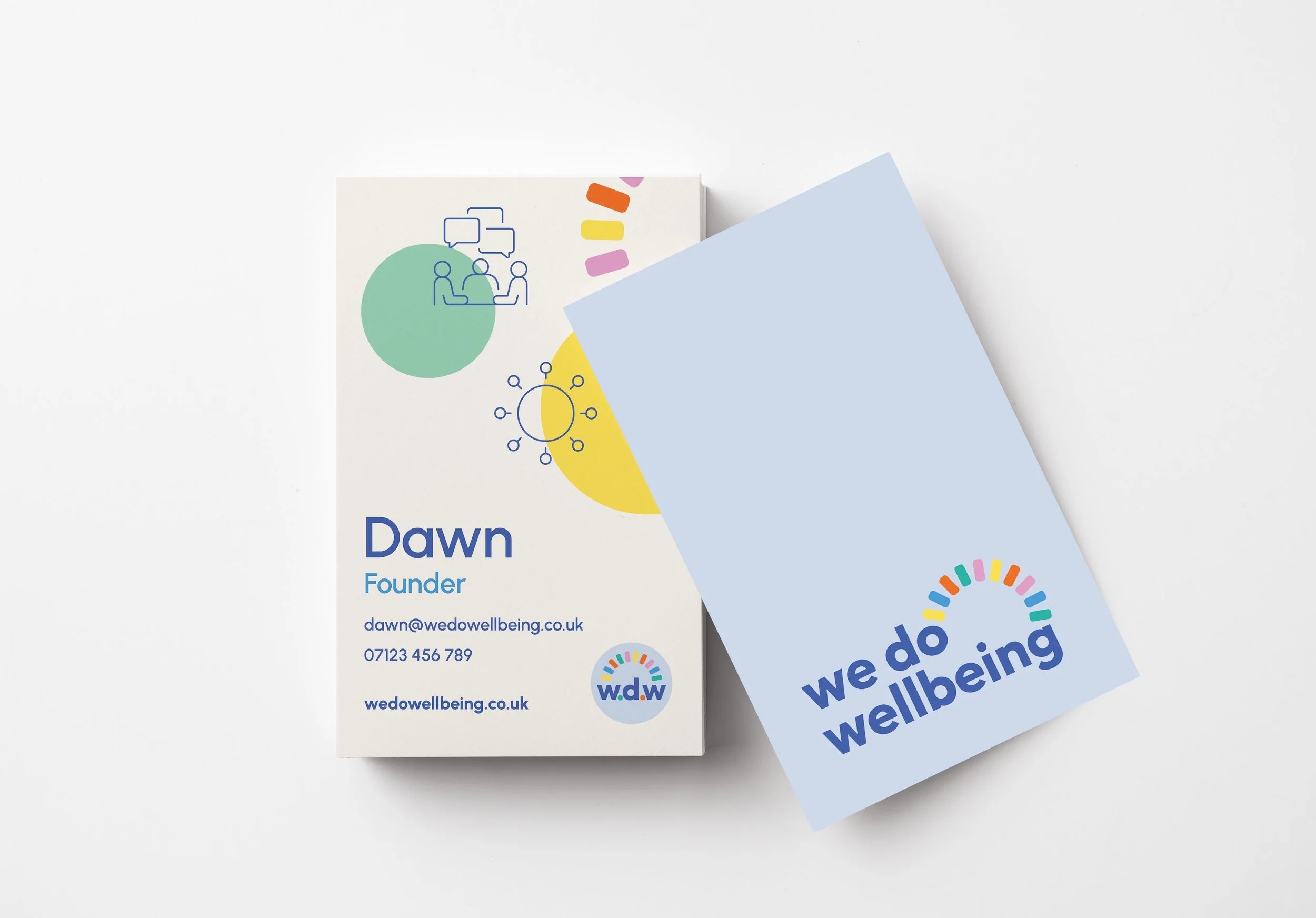 Business cards and flyers for 'Dawn', of we do wellbeing, featuring colourful graphics. A consultancy business. Design by Hubble.