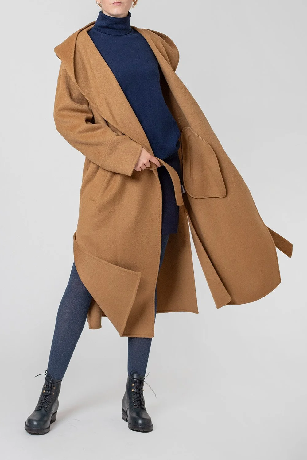 Indigo knit sweater with camel coat