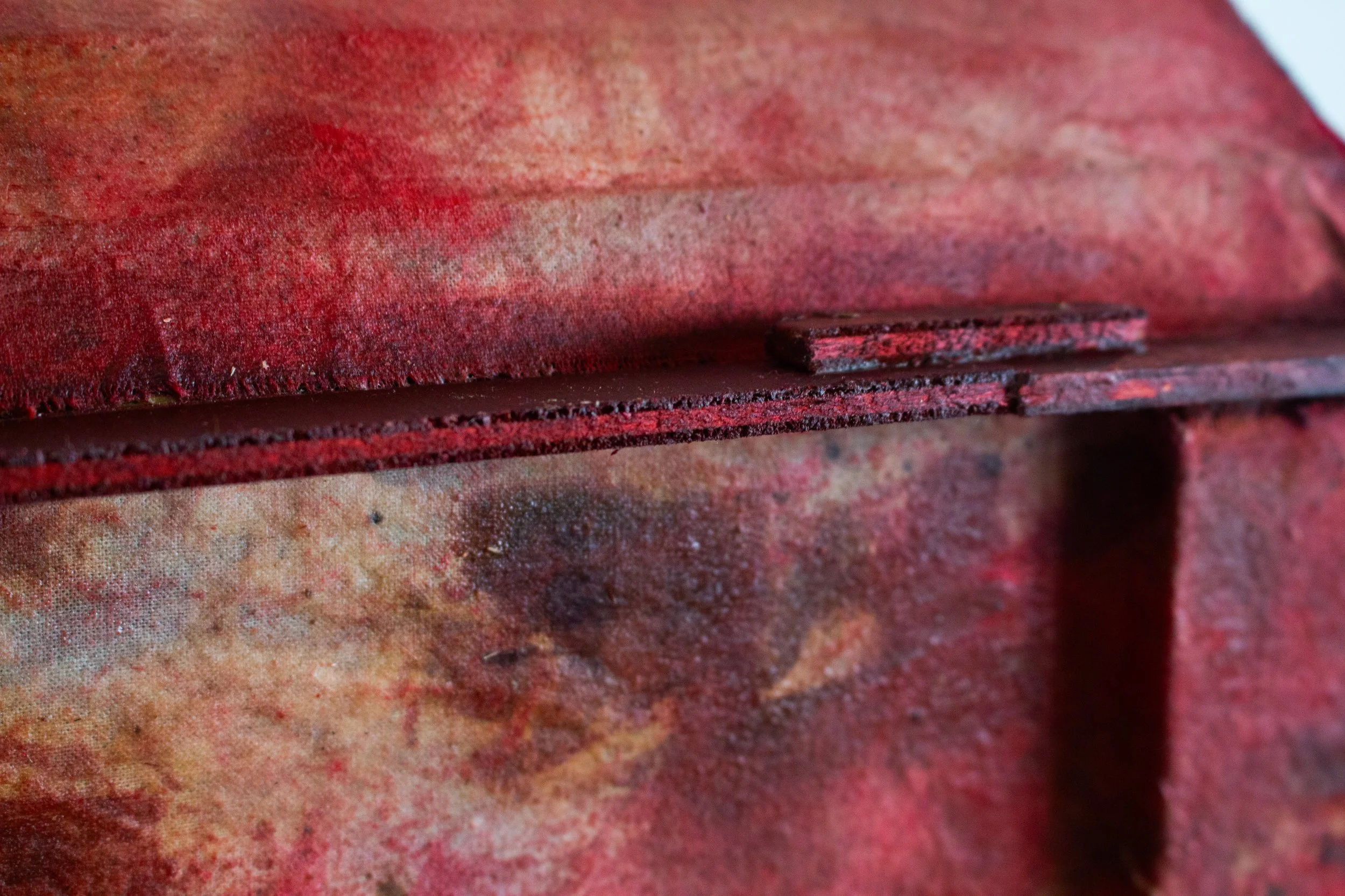 Detail of "Boite aux lettre (rouge)" -wood, acrylic, textile, wax, 2025    
