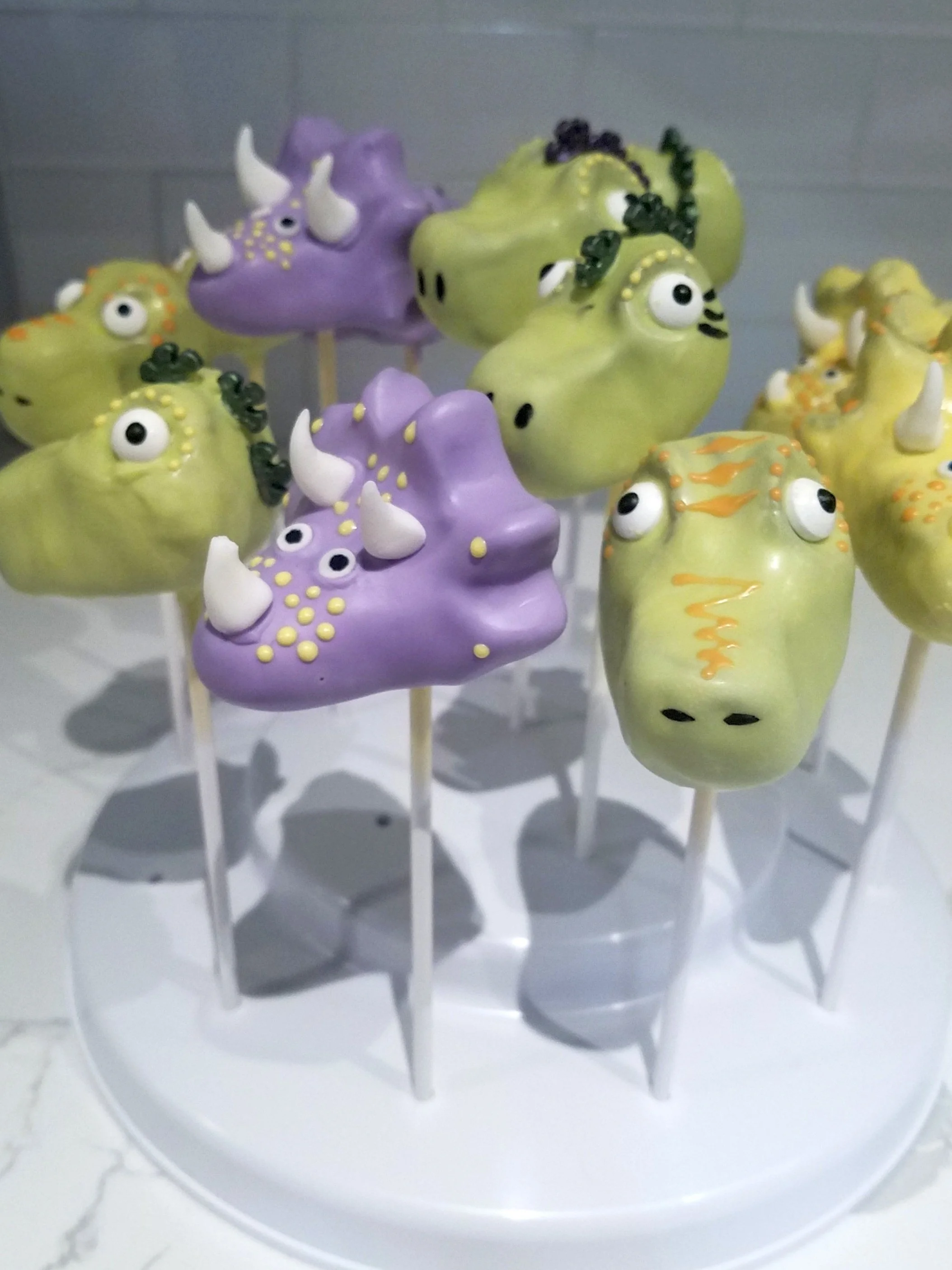 Dino Pops, 2020
Hand shaped chocolate cake, hand painted details, and hand crafted fondant horns