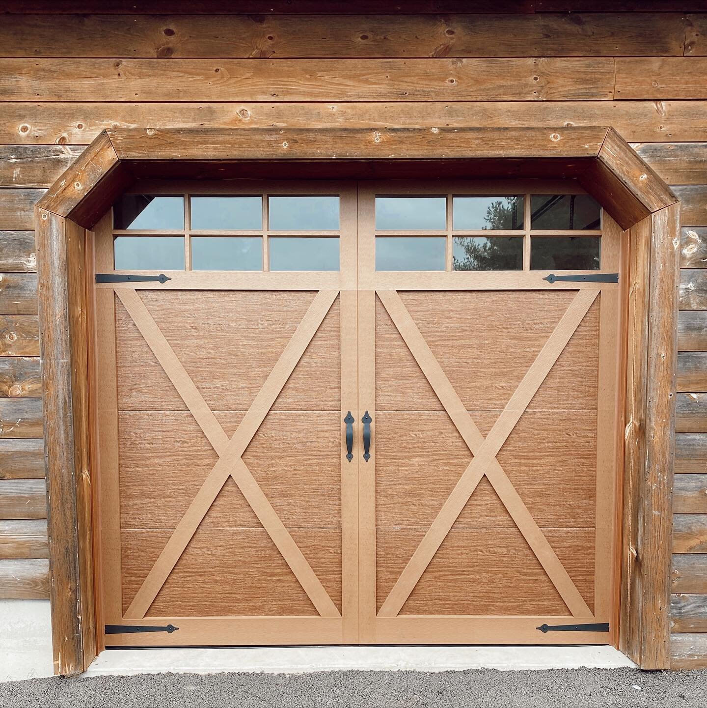 Happy Friday! Here&rsquo;s a new door we installed a few months ago. These carriage style doors are one of our best sellers!