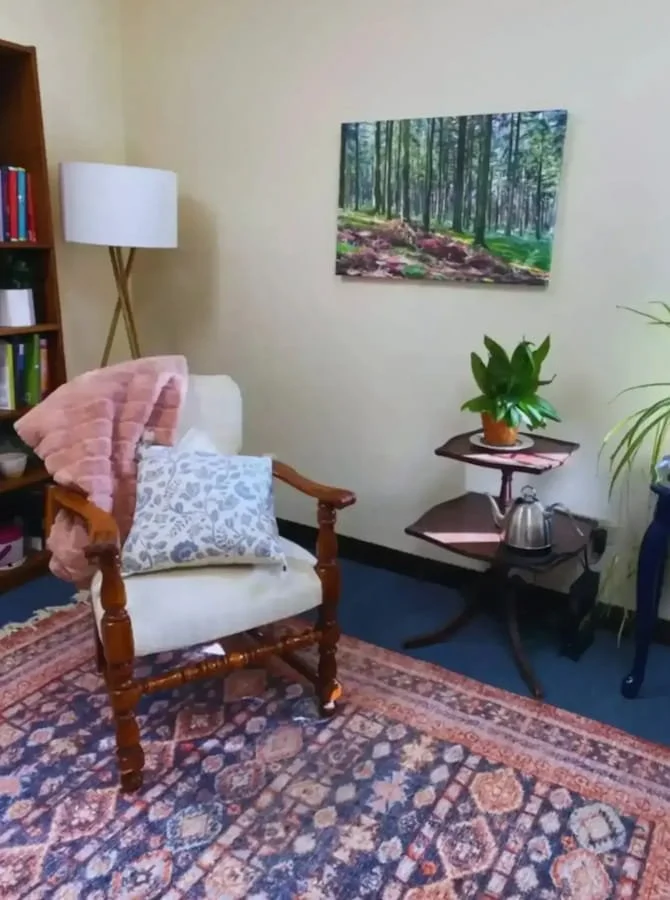 A chair and table in the office