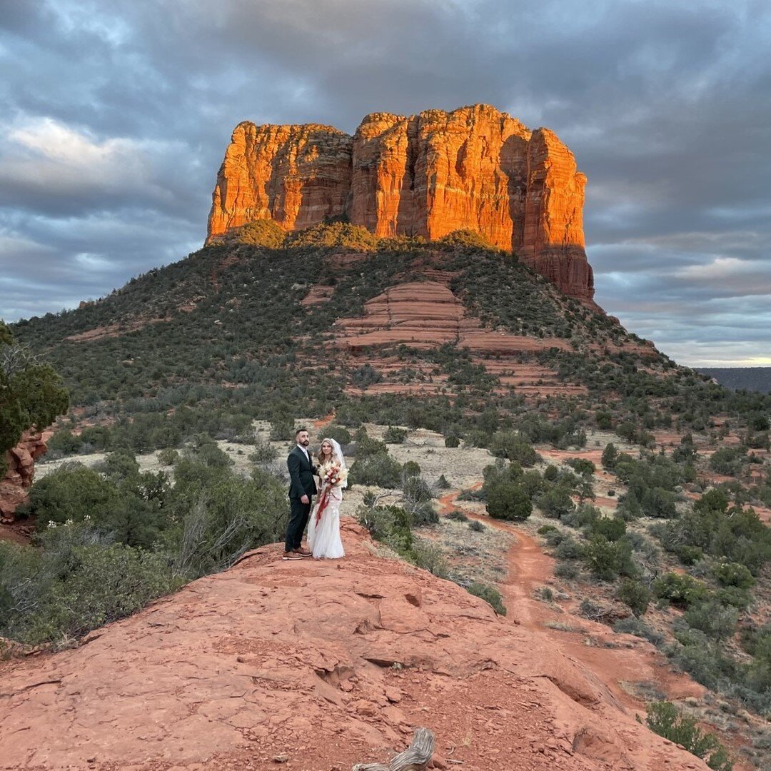 So far away, and yet so close... One of our favorites, this wedding was gifted with such dramatic skies! I love marrying outdoor couples anywhere near Courthouse Rock - so I can make my corny joke &quot;If people complain that you didn't invite them 