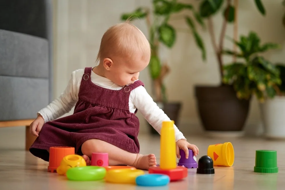 Baby playing with blocks | SACCounty Healthy Beginnings