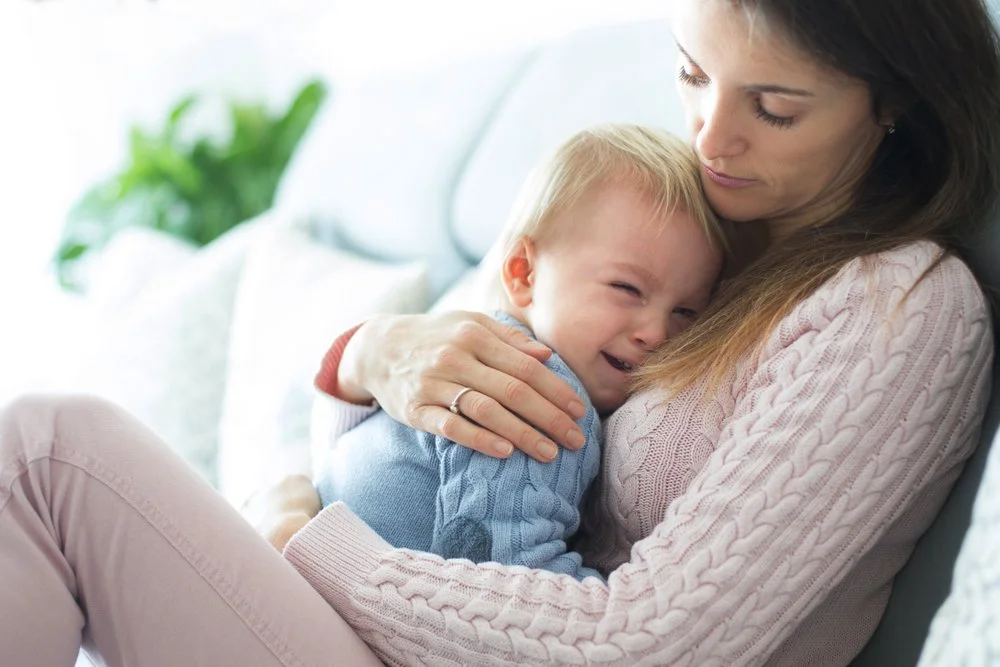 A mother hugging her sad child | SACCounty Healthy Beginnings