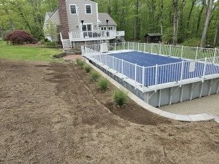 New retaining wall around existing above ground pool 