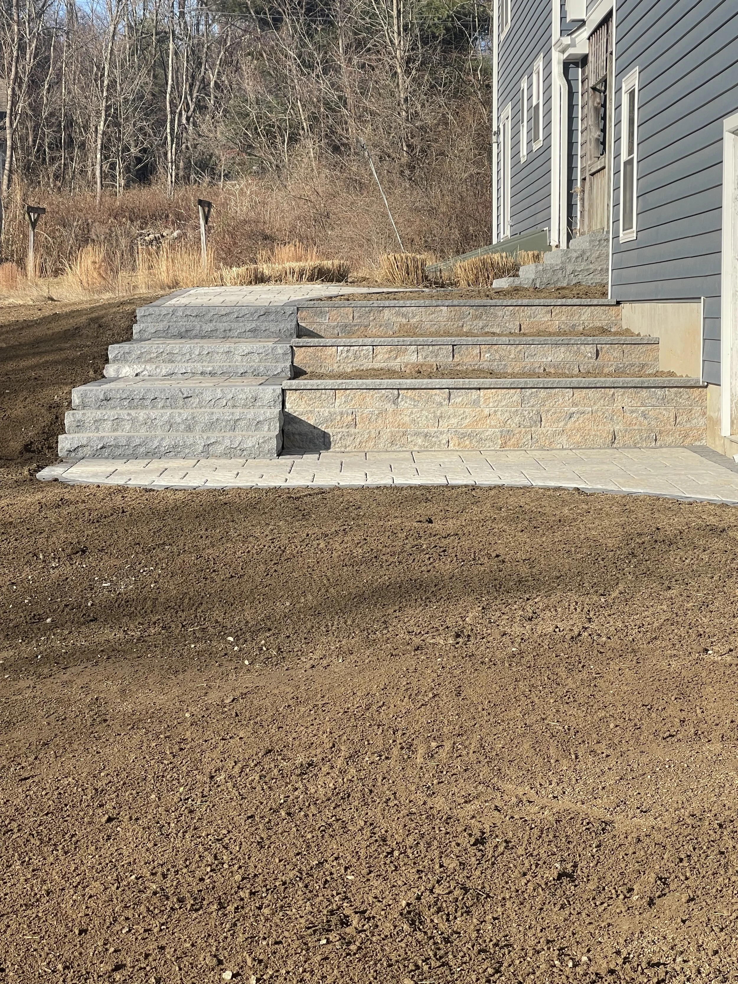 Three stepped raised beds with steps difference view