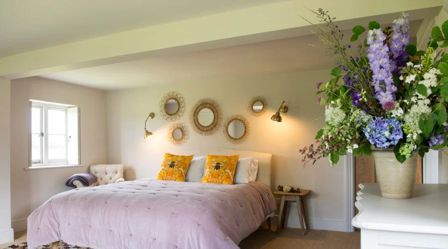 QoR Venues 42 Acres bedroom purple flowers.jpg