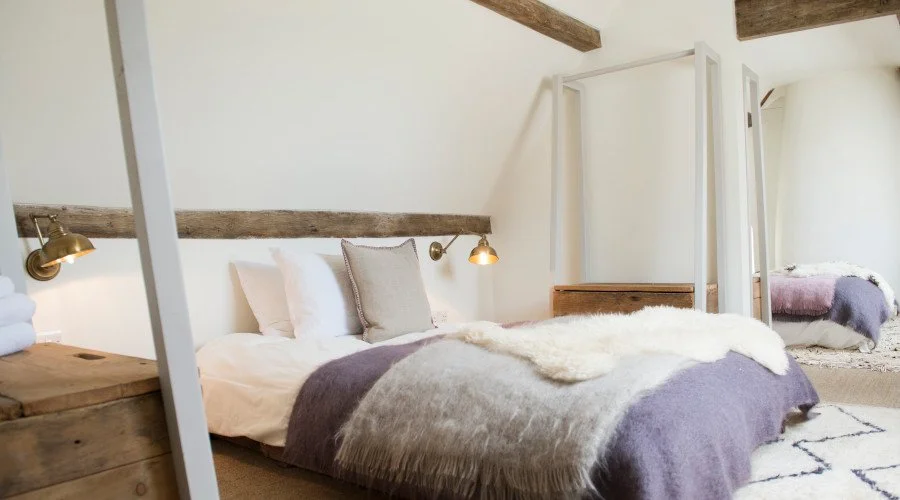 QoR Venues 42 Acres bedroom with fur throw.jpg