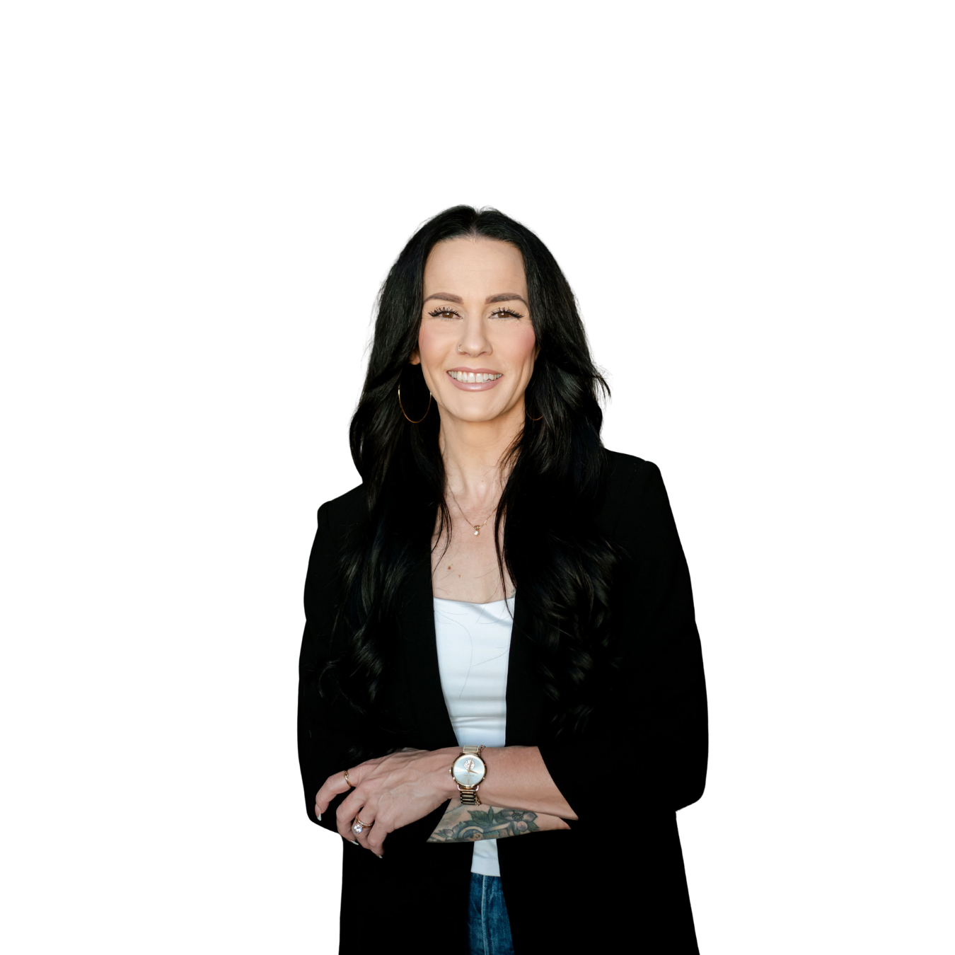 Operations advisor Gwen Taniguchi standing with her arms crossed against a black background.