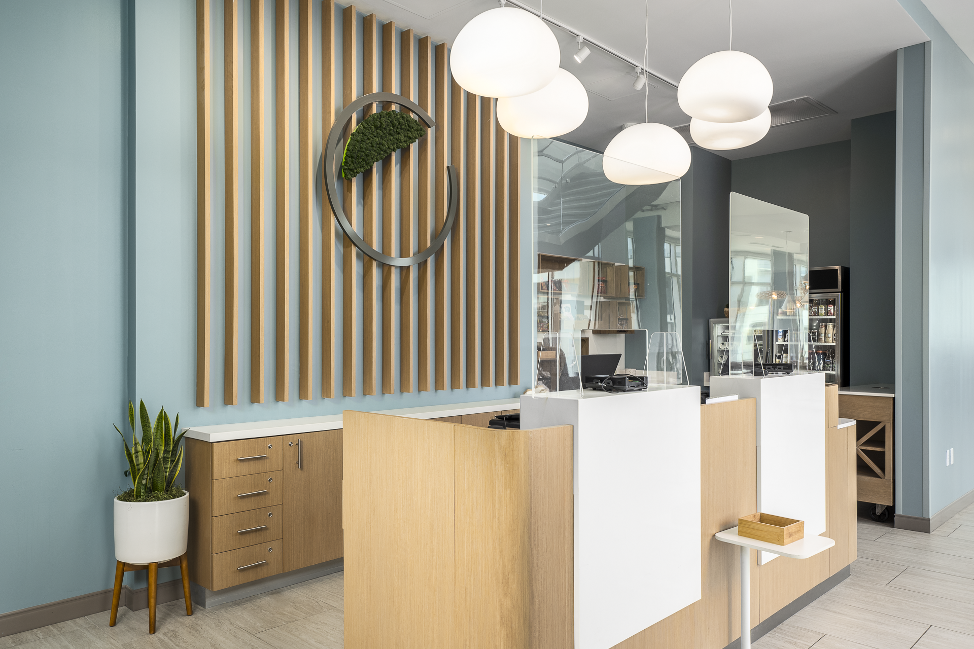 Element hotel front service desk and decorative millwork behind desk