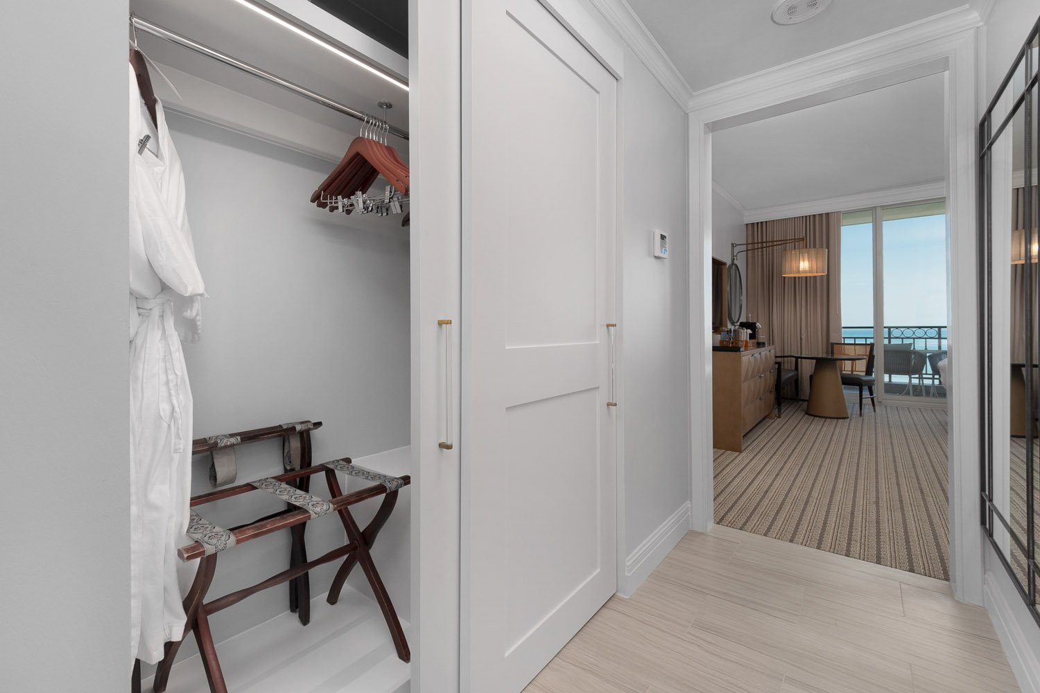 Custom closet shelving and doors in Ritz-Carlton guest rooms