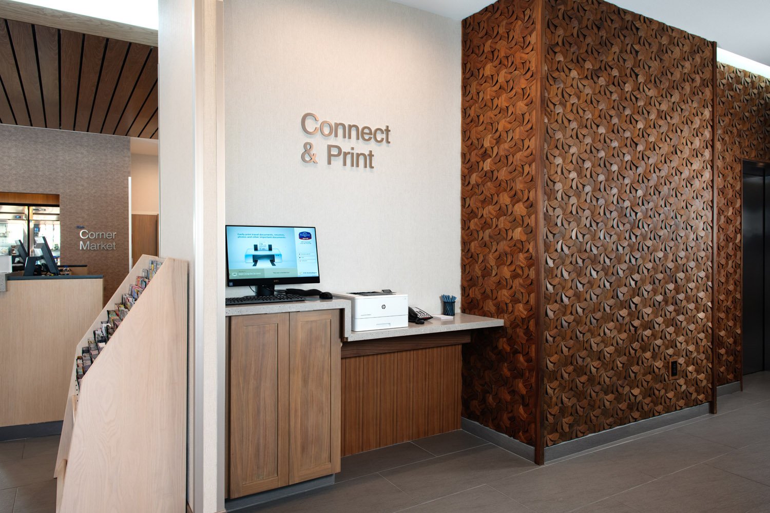 Custom divider walls, textured glass, cabinetry, and countertops.