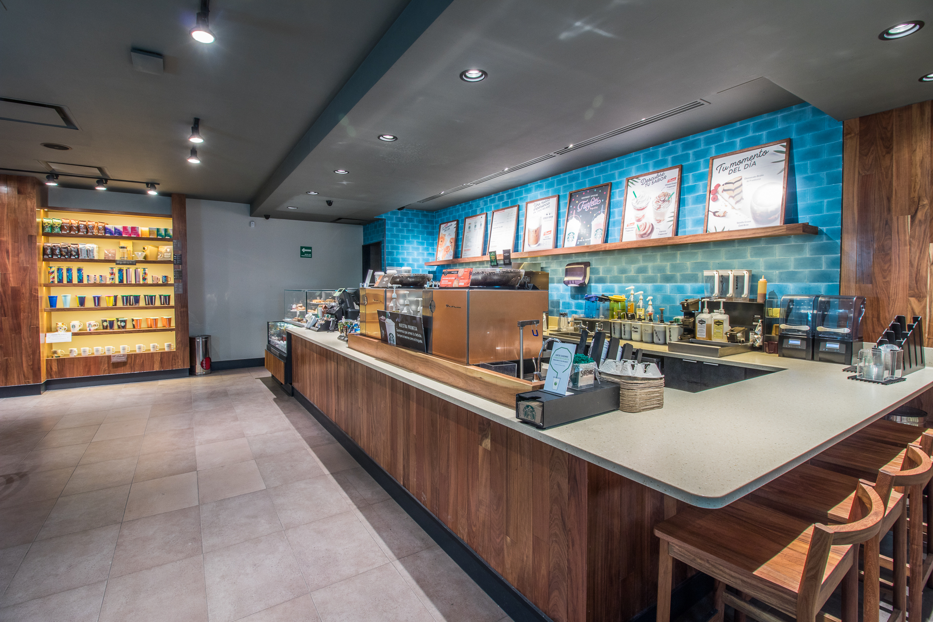 Starbucks front service counter and merchandise available for purchase