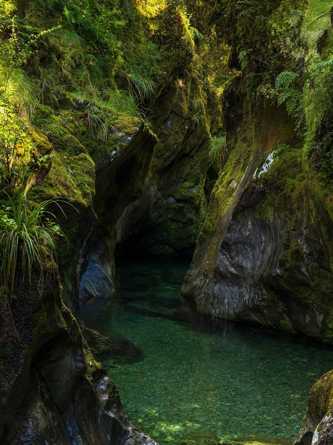 I enjoy finding those spots that are hidden away from most photographers. This is one of those. It is known by the canyoneering community in New Zealand.  I&rsquo;ll share this much it&rsquo;s on the South Island.
The light was beautiful and dancing 