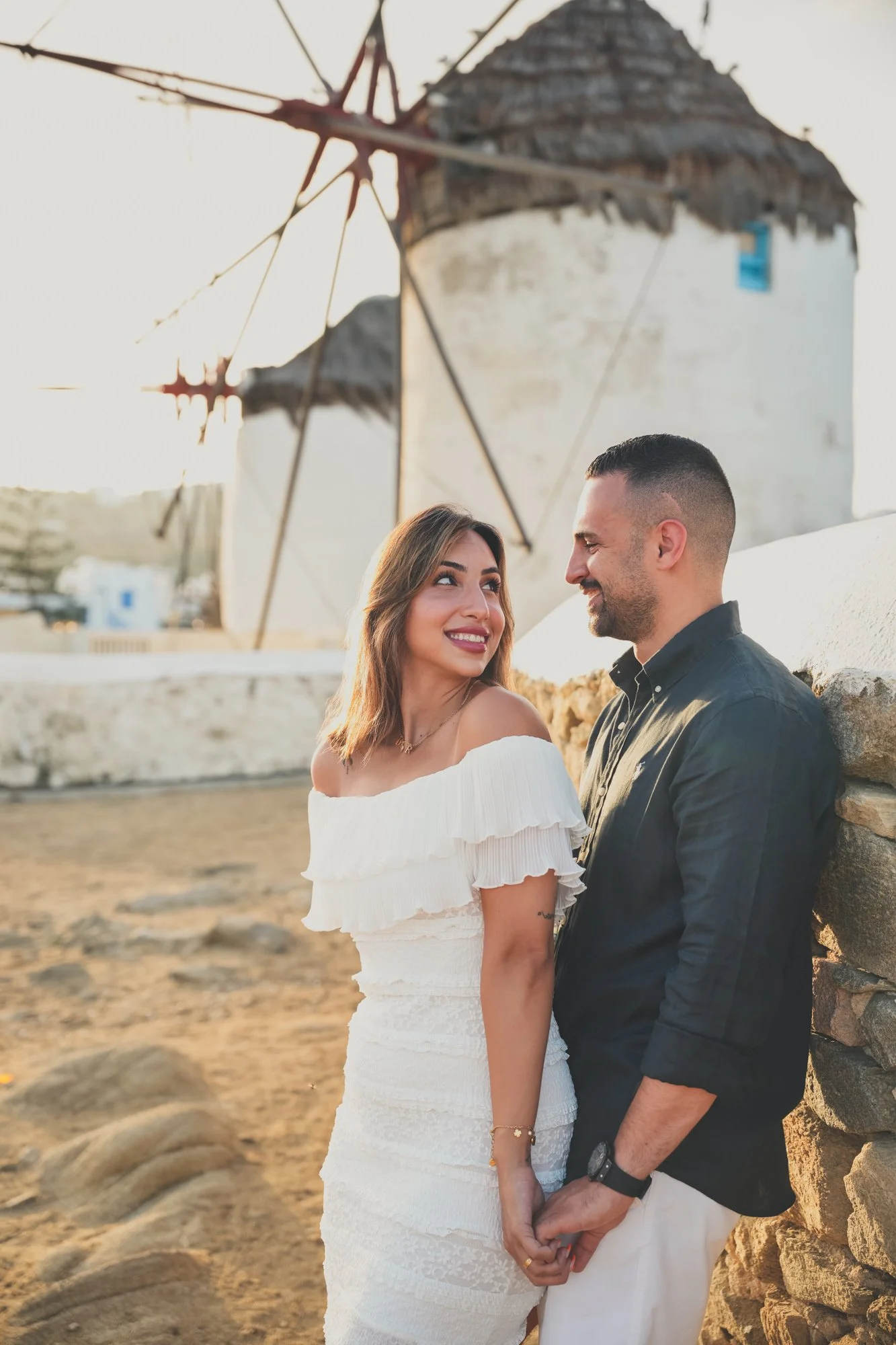 couple by the windmills of mykonos.jpg